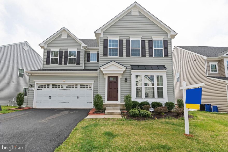 A charming colonial located in the much desired White Marsh area. Close to major highways which make for easy commutes and access to plenty of shopping, restaurants and entertainment. Main level special features include: recessed lighting throughout, crown molding in the sitting room and dining room, hardwood floors throughout the kitchen and hall. Second level features an over-sized loft, master suite with en suite containing a luxury bathroom with roman shower, a generous walk in laundry with ample storage, ceramic tile in bathrooms and recessed lighting throughout. Basement features an option for a 5th bedroom with walk-in, large rec area with additional space off the media room, full bathroom, ceramic tile in the bathroom, and an over-sized unfinished storage room.The main level features an amply sized front sitting room which may be converted into an office space. The spacious family room opens to a gourmet kitchen with upgraded appliances, an over-sized chef s pantry & breakfast nook which is flooded with light. An expansive mudroom with a closet leads to the garage.The upper level boost an over-sized loft with a walk-in closet. Additional linen closet and a large walk-in laundry with storage. The master suite has two walk-in closets, linen closet and a luxury en suite. Three additional bedrooms and a full hall bathroom.Basement is fully finished with a 5th bedroom and walk-in closet and full sized window. The basement is expansive with large finished rec room and an additional sitting room space off the media room. The media room could serve as a possible 6th bedroom. There is a full bathroom with a tub and shower. Basement could also potentially serve as an in-law suite. There is a security door and walk-out to the yard.Outside features an underground sprinkler system, 360 security system with timed motion lighting, tiered gardens which are beautifully maintained and an over-sized garage with extra high ceilings for ample storage space.