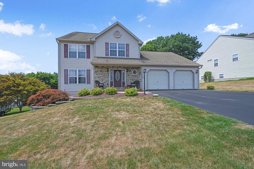 Pride of ownership is evident throughout this spacious contemporary in Blue Mountain School District.  Natural light cascades throughout enhancing the ambiance of  this fabulous floor plan! The entry dressed with tile underfoot gently introduces the formal & casual living areas. A tray ceiling, cove molding and chair rail enhances the formality of the formal dining room.  Quartz counters elevate the  20 handle kitchen  with pantry, & a center island  maximizes  workspace. The appliances remain, The casual dining area effortlessly unites the kitchen & family room.  The propane fireplace (propane tank has been removed) and the tv above are the focal point of the family room.  (The tv remains) Main level  laundry room and half bath add convenience.  The upper level boasts a generous master suite complete with double sink vanity on suite bath and an 11 x 5 walk-in closet.  A skylight brightens the family bath.  Three additional bedrooms (1 currently utilized as an office) complete the second floor. Ceramic tile & lovely industrial quality  laminate add beauty & unity to the rooms. The large basement with double door daylight entry offers opportunity & options to finish to meet your wants & needs. Enjoy al Fresco dining on the oversized trex deck complete with awning for sunny day comfort. Sip your favorite beverage & enjoy the tree & hillside view! An invisible dog fence frames the front & rear yard. The heat pump & air conditioning unit were replaced in 2020.  Clean, Spacious & Ready for your move!  Don't miss this one!!
