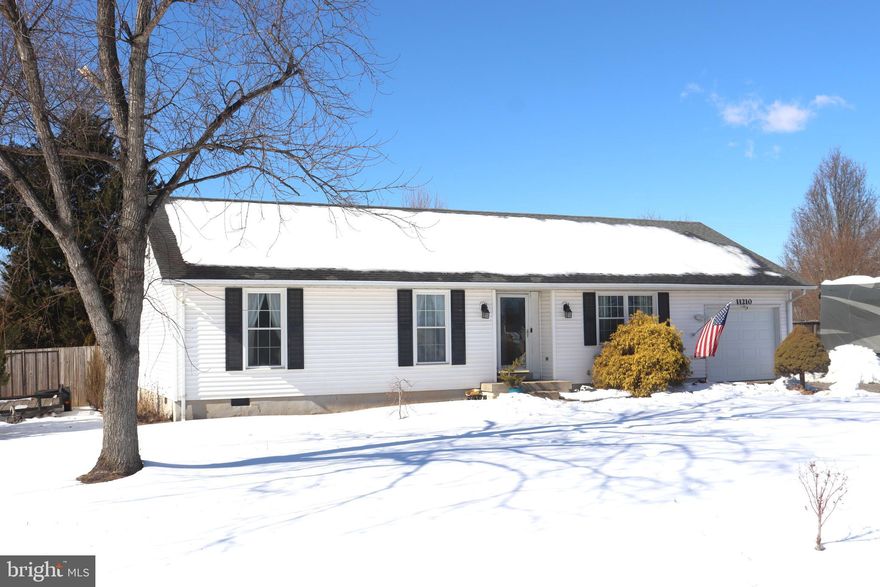 Well-maintained rambler offering comfortable one-level living on a .57-acre lot. This 3-bedroom, 2-bath home features some new carpet and  some fresh paint. The layout includes an eat-in kitchen, nice living room, separate dining room (currently used as work area), and a primary bedroom with private bath, plus two additional bedrooms with a hall bath. An oversized one-car garage provides extra space for storage or a work area. Enjoy outdoor living with a deck, patio, and large fenced rear yard. Conveniently located close to schools, shopping, and major commuter routes. Why buy a townhome when you can have a single family home at this price.