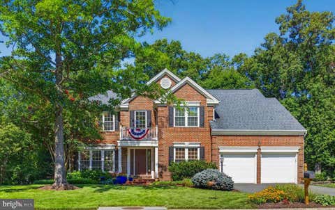 Photo of 13708 Bridlewood Drive, GAINESVILLE, VA 20155 (MLS # VAPW2126820)