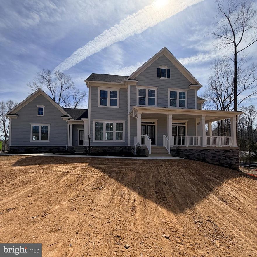 Professional Photos Coming Soon!

Exceptional point lot on the private side of Lake Anna with spectacular views and over 200 feet of shoreline. Coming Soon is a fully completed Millwright Floor Plan by Evergreene Homes, ready just in time for the 2026 summer lake season. This luxurious waterfront home offers over 6,000 finished square feet across three finished levels, featuring 4 bedrooms, 5.5 bathrooms, and 2 bonus rooms. The upper level includes 3 bedrooms and 3 full bathrooms, including a stunning primary suite w/ large walk-in-closet and master bathroom positioned to maximize lake views. The main level is thoughtfully designed for entertaining, with an open-concept layout, a deluxe kitchen featuring white cabinetry, quartz countertops, and a beautiful backsplash, plus a warm and inviting living area with a stone fireplace and coffered ceilings. Step outside to enjoy the low-maintenance composite deck and screened porch, both overlooking the breathtaking water views. A private main-level mother-in-law suite adds flexibility and convenience. The walk-out lower level offers a spacious recreation room with plumbing already in place for a future wet bar or mini kitchen, along with an additional bonus room and full bathroom, creating the perfect private retreat for guests after long lake days. Outside, enjoy easy access to the water from the walk-out basement leading to the double-slip boathouse, complete with composite decking, extra seating space, and additional storage (included in price). This home is truly turn-key! Additional features include a passive radon mitigation system, 2x6 framing, Tamko Titan 30-year architectural shingles, a concrete sidewalk from the driveway, beautifully installed landscaping, privacy trees, and much more.

Come experience lake life at Compass Cove and enjoy added peace of mind with Evergreene Homes’ 10-year warranty.