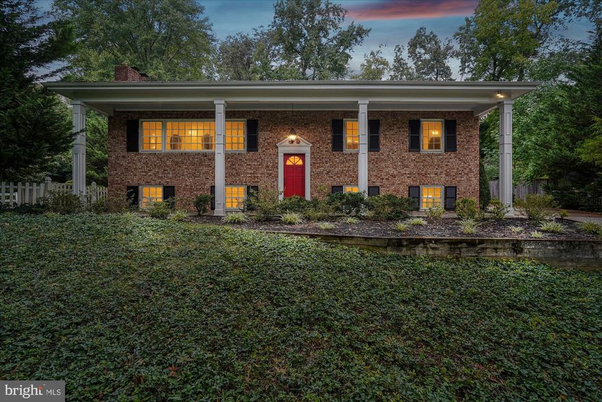 Welcome to this beautiful brick single-family home in the sought-after Hollindale neighborhood, perfectly situated on over half an acre and set back from the road for a true sense of privacy. This spacious 5-bedroom, 3-bath retreat offers a serene lifestyle with an expansive, landscaped backyard, a large deck ideal for entertaining, and a two-car carport with attic storage. Inside, the main level features a bright and inviting living room with a cozy fireplace and oversized window, a separate dining space with French doors to the deck, and a stunning chef’s kitchen. Designed for both everyday living and entertaining, the kitchen boasts a 6-burner Wolf gas range, prep sink on a large center island, stainless steel appliances, wine refrigerator, double pantry, and crisp white cabinetry. Recently refinished hardwood floors flow throughout the main living areas, adding warmth and character.

The lower level extends the home’s versatility with two additional bedrooms—ideal for guests, a home office, or workout space—plus a large open family room with a fireplace and plenty of natural light. A generous utility room offers abundant storage, laundry, and direct access to the carport for everyday convenience.

The backyard is a true highlight, complete with a shed, new pavers, mature trees, and ample space to relax or host gatherings. Thoughtful updates provide peace of mind, including a full roof replacement (2018), new deck (2020), fresh exterior paint (2020), carport paint (2025), and recent appliance upgrades such as the washer/dryer, wine fridge, and microwave. Ideally located with easy access to the GW Parkway, Old Town Alexandria, Fort Belvoir, and Washington, DC, this home combines comfort, style, and convenience in one exceptional package.