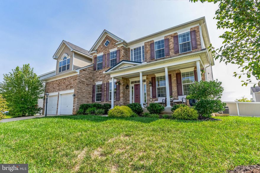 Stunning stone-front Princeton style colonial loaded with upgrades galore and a stunning open-concept floorplan with TONS of space!! Featuring a huge gourmet kitchen w/granite countertops/Island &stainless steel appliances, Bright morning room/dining room, family room with 2 story  ceilings, main level 5th BR with full bathroom, plus 2 additional rooms on main level that can be used as flex space - office, playroom, BR, etc! Upper level features 4 spacious bedrooms including primary bedroom with sitting room and 2 walk-in closets plus luxury spa bathroom w/double walk-in shower. Fully finished walk-out basement has an extra large recreation room with wet bar (perfect for entertaining), 2 large storage rooms, plus a finished bonus room that has built-in shelving - perfect for an additional hobby room, dressing room, etc!   Attic has additional storage too! Fully fenced back yard with patio and shed! Wonderful private community with large play areas and tennis courts! Close to National Harbor, DC & VA!!