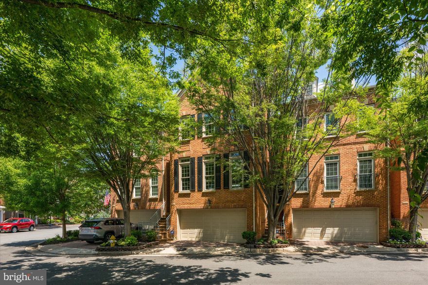 Welcome to this meticulously maintained and stunning four-level Randolph model, ideally located on a mature, tree-lined street in the heart of Cameron Station. This sun-drenched home features 4 spacious bedrooms with the flexible option for a 5th on the entry level, thanks to a separate office/den adjacent to a newly added full bath. Hardwood floors span three levels, and the beautifully remodeled, rarely available country kitchen showcases white cabinetry, quartz countertops, stainless steel appliances, and an open layout ideal for entertaining.

Significant updates offer peace of mind and modern comfort, including brand-new windows and sliding doors, a new roof (2020), new lower-level HVAC system, new water heater, and new luxury vinyl plank flooring throughout the entry level. With four full bathrooms—two of which are newly added—and built-in garage storage that conveys, every inch of this home has been thoughtfully upgraded. The oversized, fenced backyard—one of the largest in the neighborhood—is perfect for outdoor living. Just minutes from the Pentagon, D.C., Old Town Alexandria, and all of Cameron Station's top-tier amenities, this home checks every box. Come see it today and fall in love!