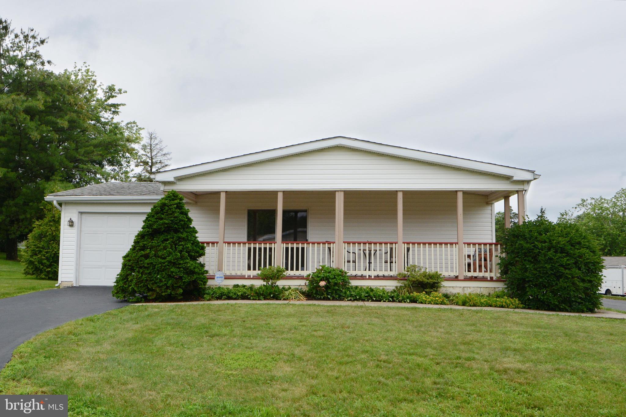 *****This home is undergoing a full interior painting this week (8/5). New Photos to come. If you have interest, act now and you'll get to choose the color pallette!*****
Welcome to easy, one-level living in the desirable Quiet Acres 55+ Community!
Step inside the front entrance to a spacious living room that opens into the dining area and kitchen. Plenty of counter space, a large island AND a walk-in pantry are some of the features that make this kitchen stand out. Off of the kitchen, you'll find a laundry room with interior access to the 1-car garage.
The primary suite is privately located on one end of the home and features a large bedroom, full bath with dual sinks, and a generous walk-in closet. On the other side of the residence, you'll find a full hall bath and a second bedroom with hardwood floors. Pass through this room to gain access to a third bedroom currently used as a home office—which also offers private access from the covered porch via sliding glass doors.
Enjoy peaceful mornings and evening breezes on the covered porch, a perfect spot for relaxing with a book or greeting friendly neighbors.
The current owner has maintained the big ticket items over the years including a recently installed new water heater, replaced the HVAC system since taking ownership, and installed new windows.
Quiet Acres offers a welcoming, low-maintenance lifestyle in a friendly and established 55+ community. Additional key features of this community provided by the President of the Resident Association- "There is a clubhouse with low cost or free activities offered by the Quiet Acres Residents Association. There is a free gym, pool table and a hall that can be rented by residents. We have a picnic area and fire pit. Our social committee plans monthly events. There is a monthly newsletter that contains a calendar listing our activities. We even have BINGO the last Friday of each month. We have a town watch that patrols the community and a board that oversees all of this." Don’t miss your chance to make this your next chapter!