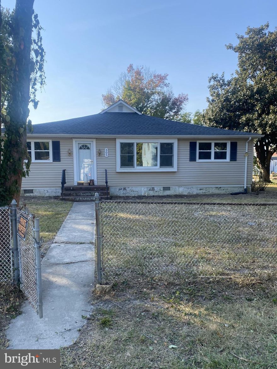 Welcome to your charming retreat at 305 Maple Avenue in Edgewater, MD! This delightful cottage is nestled on a generous .41-acre lot, offering a serene water view that will captivate your senses. With 1,872 square feet of living space, this home is a blank canvas ready to be transformed into your personal haven.

Step inside to discover an updated kitchen that will inspire your culinary creativity. The new windows, siding, and roof not only enhance the home's aesthetic appeal but also ensure energy efficiency and comfort. The recently installed HVAC system promises year-round comfort, making this cottage a cozy refuge no matter the season.

Outside, the detached garage provides ample storage or workspace, catering to all your needs. The expansive lot offers endless possibilities for outdoor enjoyment, whether it's gardening, entertaining, or simply relaxing and soaking in the tranquil water views.

Don't miss the opportunity to make this picturesque property your own. Experience the perfect blend of charm, modern updates, and natural beauty at 305 Maple Avenue.  Property is sold As Is.