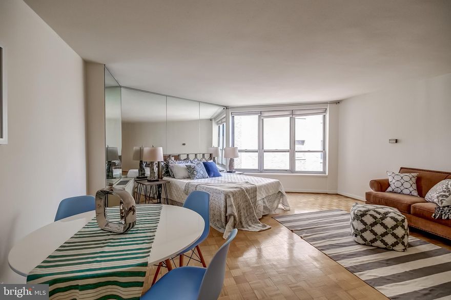 Spacious studio apartment located on a high floor of The Dorchester, featuring partial Rittenhouse Square views! The living area features an entire wall of windows beaming with natural light. There is a separate updated kitchen with dark stained wood cabinetry, granite countertops, and stainless steel appliances. A dressing area leads to the full bathroom, which features a shower/tub combination and updated tile floor. Residents of The Dorchester enjoy a twenty-four hour doorman and all utilities except cable. Use of the building’s state-of-the-art fitness center, seasonal rooftop pool club, and valet parking in the building’s underground garage (subject to availability) are available for an additional fee. No pets permitted.