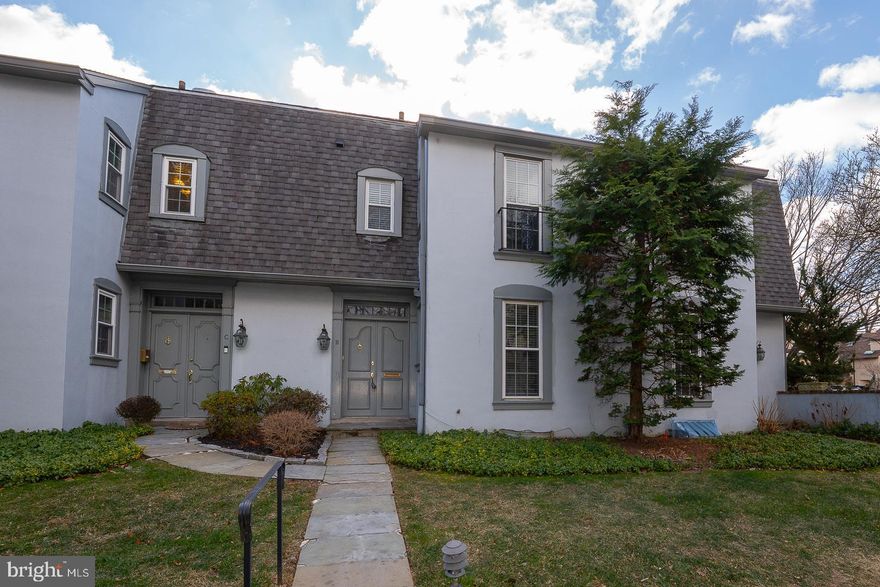 Experience the best of Main Line living in this beautifully updated 3-bedroom, 3 full bathroom, and 1 half-bathroom townhome ideally located in the heart of Suburban Square. Just steps away from the Ardmore Farmers Market, Trader Joe’s, Lifetime Fitness, and a diverse range of shops, restaurants, and cafes, this home offers both luxury and walkable convenience. Step inside to a welcoming entrance foyer with a coat closet and a brand-new guest powder room. The spacious living room features rich wood floors, a cozy wood-burning fireplace perfect for relaxing evenings at home. A sliding glass door opens to a private fenced patio, ideal for morning coffee, outdoor dining, or entertaining friends. The renovated kitchen is a chef’s delight with all-new stainless-steel appliances, a double-door refrigerator/freezer, a built-in microwave, and a dishwasher. Brightened by two windows, it features ample wood cabinetry, modern fixtures, and a convenient breakfast bar that opens seamlessly into the dining area, making it an ideal setting for casual meals or hosting gatherings. Upstairs, the second floor includes two comfortable bedrooms, each with generous closet space and two new, beautifully tiled full bathrooms, along with a linen closet in the hall for added convenience. The third floor offers a private and versatile loft-style bedroom, complete with a new full bathroom, a large closet, and sliding doors leading to a private deck, making it a wonderful retreat or home office option. There’s even attic storage for added practicality. The newly finished lower level offers a flexible space that can serve as a family room, media area, or home office, complete with a closet, full-sized washer and dryer, utility area, and ample storage. A truly walk-to-everything location with the award-winning Lower Merion Township Schools. This home blends suburban comfort with city convenience in one of the Main Line’s most sought-after neighborhoods.