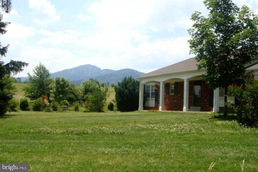 NOTE: All showings and access will be scheduled through owner. Please call or email owner. No lockbox available.  A preliminary application required before showing. Please use NVAR application, owner will provide if needed. 

The property is located in the foothills of Old Rag Mountain & Shenandoah National Park, close to the trout-stocked Hughes River and Sharp Rock Vineyard. Built in 1962 and extensively renovated in 2006, this charming property offers a serene retreat in a picturesque setting, featuring 4 bedrooms, 3 full baths, spacious well-equipped kitchen, dining room, laundry room, propane fired gas fireplace, and central air and heat. This home provides comfort and functionality. Enjoy stunning views of Old Rag Mountain and the neighboring countryside. Many on-site trees provide shaded areas to enjoy the outdoors in the summers. This Sharp Rock home offers the perfect blend of tranquility and natural beauty. Sperryville is nearby with restaurants, art galleries and shops. Partial furnishings are available, so please inquire for more details. If you're ready to experience the allure of this countryside haven, don't hesitate to ask for an application in order to schedule a showing and discover the charm of this remarkable property.

IMPORTANT NOTE: The rental listing includes approx. 1 acre of property for which tenant is responsible for maintenance. The owners will retain use of the rear studio, accessing it through the front and side yard of the rental property.