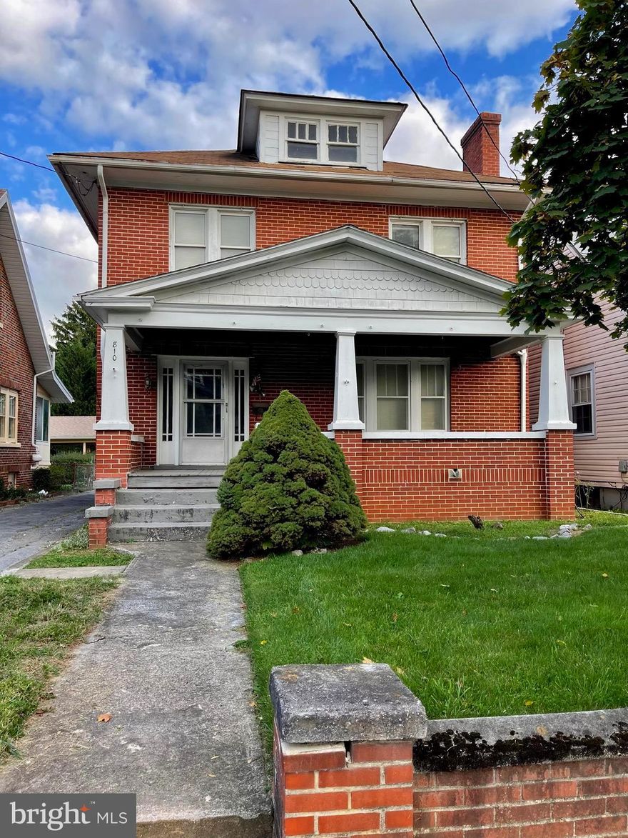 ***Back on the market!! ***  This American Foursquare home has so much potential and a brand new roof!!!  From the large porch on the front, to the arched doorways throughout main level, wood burning fireplace, a kitchen alcove and hardwood floors, this beautiful home is ready for your updates!   The upper level has 3 Bedrooms and 1 Large bath and an attic above for extra storage!  The unfinished basement has a washer and dryer and lots of additional space for anything you decide to do with it!  A long driveway leads from alley behind the home to the front of the house, there is also a 1 car garage, back porch and a small yard as well.  This home is close I-81, Hospital, MARC Train and Shopping.  Don't miss the opportunity to see this great home and begin to envision what you will do with it!