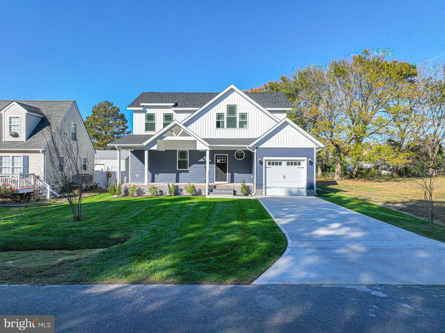 Introducing “The Abbott House”, an all-new, custom built, 4-bedroom home in highly sought-after West Ocean City.   Incredible design by Haley Architecture with high end finishes and exquisite craftsmanship.  Enjoy first floor living in the spacious owner’s suite featuring 12’ ceilings, walk-in closet and beautifully tiled bathroom. The great room boasts 20’ ceilings, great natural light and a gas fireplace.  Plenty of room to entertain in the open kitchen and dining area, including a large granite island, ample cabinet space and stainless appliances.  The upstairs loft provides excellent space for an additional sitting room or home office.  Also, on the second floor you’ll find three additional bedrooms, one which has its own attached bathroom and tiled shower.  The hall bathroom features an elegant vanity with gold finishes and soaking tub.  Abundant outdoor living space can be enjoyed on the 30’ covered front porch overlooking woods or in the backyard on the 18’x10’ open composite deck.  Park in the attached garage or long concrete driveway.  Take advantage of no HOA or city taxes in Cape Isle of Wight.  This home must be seen in person to appreciate the precision construction and great attention to detail.  Schedule a showing today!