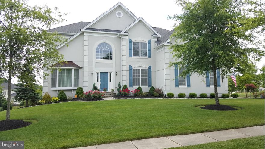 Beautiful corner lot sanctuary with 6000+ Sqft. 3 car side entry garage, Large master suite w/ sitting area offers a true sense of seclusion and privacy. This home features 3 additional very large bedrooms, a fully finished bsmt with over 1,900 Sqft for entertaining includes a wet bar, home theater room, a home gym, and a walk out basement to a huge slate patio.