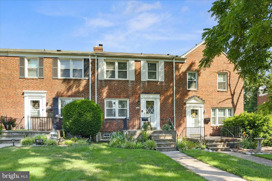 THE ONE YOU'VE BEEN WAITING FOR! Phenomenal Townhome convenient to nearly everything in Baltimore & SW county area.  LOADS OF LOVE & UPGRADES BY OWNER: Upgraded ROOFING!! 2016 KITCHEN REMODEL boasts OPEN-CONCEPT kitchen-dining area with GRANITE COUNTERTOPS, YOUNG APPLIANCES, CUSTOM CABINETRY, GAS COOKING & TIMELESS & DURABLE cork flooring!! FANTASTIC 3-season BONUS ROOM off the kitchen, makes for easy entertaining or relaxing getaway at home! LOVELY original HARDWOOD floors & NATURAL palette throughout!   3 GENEROUSLY-SIZED BEDROOMS!! Incredibly CHARMING  floor-to-ceiling BUILT-IN bookcase-like shelving & cabinetry in primary & secondary bedrooms!!  Bedroom closets offer more space than most. Quaint Catonsville original bathroom subway tile & flooring; upper level full bath with GIANT linen closet!  Well-lit FINISHED Basement with 1/2 bath, & plug-in FIREPLACE, adds character & warmth to this cozy space!  Privacy windows in basement. Great STORAGE in basement!! Basement walks up to FULLY-FENCED REAR yard with PRIVATE PARKING FOR 2!! Pretty Perennials by front patio are minimal maintenance and promise bright color to greet you each day, year after year!   Attic offers some storage!!    HVAC upgrades since 2012! ENTIRE ELECTRICAL SYSTEM UPGRADED 2020!! This IMPECCABLY UPDATED & MAINTAINED townhome is a WONDERFUL place to call HOME!!
