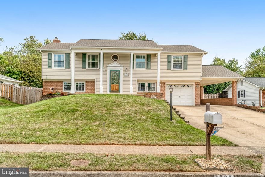 This well-maintained split foyer (Nottingham model) in the highly desirable Greenbriar neighborhood offers over 2,100 square feet of comfortable living space with a smart blend of updates and classic charm. Featuring four spacious bedrooms and three full bathrooms, this home provides flexibility for any lifestyle. The upper level boasts a bright living room, a functional kitchen with room to customize, and a dining area—perfect for entertaining or quiet evenings at home. The lower level offers additional living space, a cozy family room, and walk-out access to the backyard. A unique bonus is the carport addition, giving you extra covered parking, while the garage—slightly shortened—still provides practical storage and functionality. The back of the garage gives you a dedicated workshop space, ideal for hobbies, DIY projects, or extra storage.  For a bonus you get a laundry chute from the primary bedroom to the laundry room.   NEW Roof and skylights in 2024. All of this in the sought-after Greenbriar community, known for no HOA, convenient commuter access, top schools, shopping, and parks right nearby.