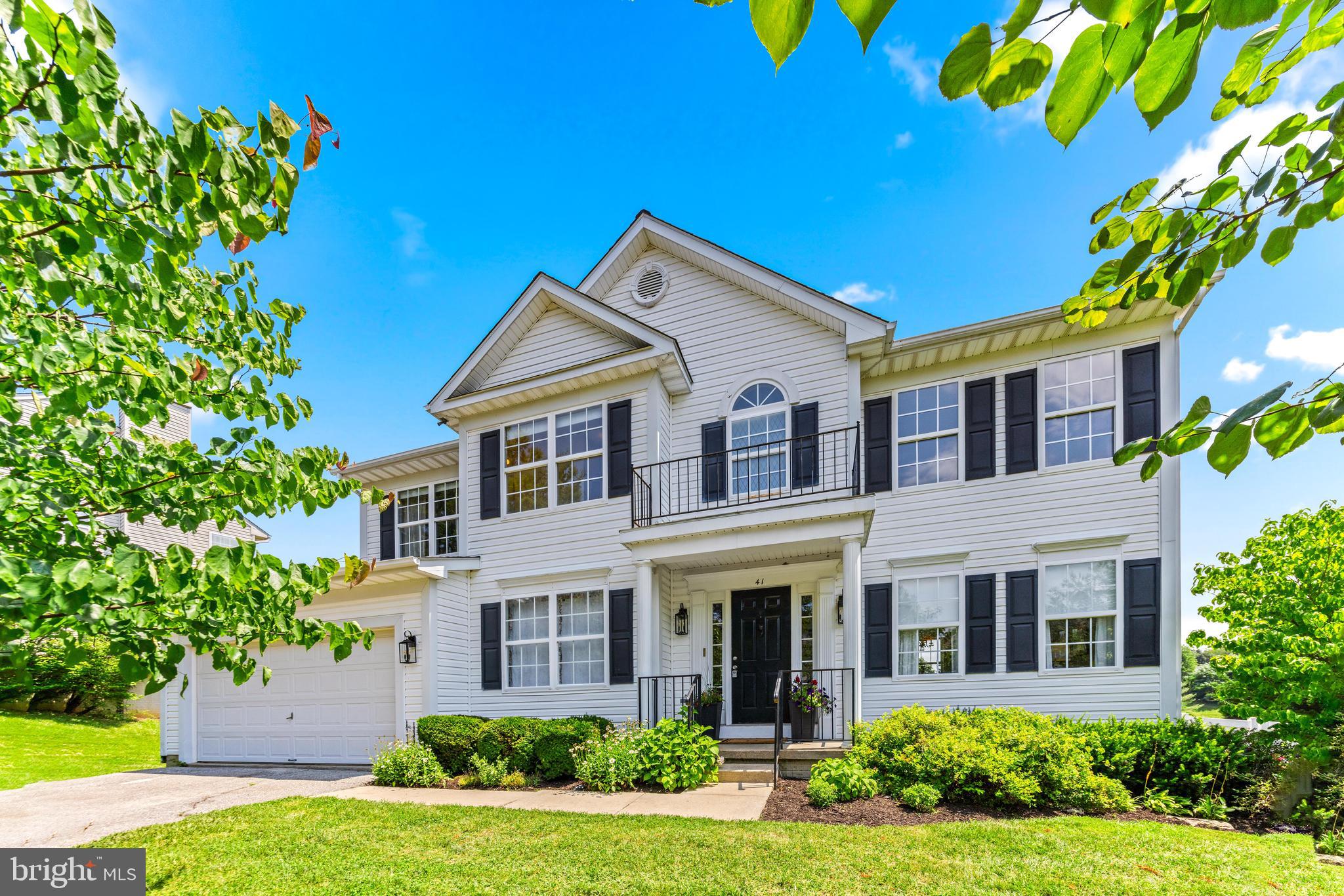 **8/2 Open house Cancelled** Welcome to 41 Wentworth Court - tucked away on a quiet cul-de-sac in Eagleview Estates. This 4 bedroom, 2.5-bath home welcomes you with an open floor plan, updated hickory hardwood flooring and tons of natural light. The country-style kitchen features butcher block island, updated stainless steel appliances and a cozy breakfast nook that overlooks the expansive vinyl fenced backyard (one of the biggest lots in the neighborhood!) A gas fireplace anchors the spacious family room, while the formal dining area and living room provide space for entertaining. On the main level you'll find an office with doors for remote working or reading. Upstairs, the primary suite impresses with cathedral ceilings, a walk-in closet, and a spa-like bath complete with a soaking tub and separate shower. The walkout basement adds potential for future living space or storage. Roof replaced in 2019. The newly installed Trex deck in 2024. The water heater was installed in 2022. Wakefield Valley Park and walking trails steps away from the front door! With a two-car garage and proximity to top-rated schools and commuter routes, this home blends comfort, convenience, and curb appeal!