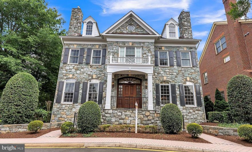 Located in the exclusive gated community of Evans Farm, this exquisite 4 BR, 3.5 BA luxury home has it all. Outside, you'll find a tailored stone facade w/portico entrance, a spectacular courtyard-style patio w/privacy planting walls, fountain, exceptional landscaping & expansive stone hardscape. Inside, you'll find  a 3-level elevator, exceptional millwork, custom-designed ceilings, custom hand-painted  murals, & 5 gas FP's. Each room in this fine home offers exceptional craftmanship! The entry foyer features hand-laid marble flooring & decorative moldings. A large breakfast room introduces the dazzling gourmet kitchen that stirs the senses w/upgraded appliances (Subzero, Wolf, Miele) including warming drawer & steam cooker, granite countertops, handcrafted cabinetry & a large center island w/prep sink & bar-style seating.  Entertain in the formal living room w/twin windows, shadow box accents & gas FP with a custom ornate surround serving as a focal point. A large fully wood paneled study harbors an additional FP, built-in shelving, wood floor & a hand-painted atlas mural ceiling that adds a tailored distinction. Relax & unwind in the family room in front of a cozy FP where a false bookshelf revolves to reveal a built-in media center. A powder room updated w/a furniture-style vanity & instant hand dryer completes the main level. Wide-plank hardwood flooring continues upstairs and into the primary suite boasting a romantic FP, separate sitting room w/coffee bar & beverage chiller, & 2 walk-in closets tailored with custom shelving. An art gallery hallway leads you into the luxurious spa-toned private bath boasting dual granite-topped vanities, a freestanding soaking tub, sauna & steam shower, fireplace, separate water closet & bidet, & a luxurious spa-toned tile-the finest in personal pampering! Down the hall, two bright & spacious BR's. each with hardwoods and generous closet space share access to the beautifully appointed dual-entry bath w/a dual-sink vanity & frameless ultra shower, as a bedroom level laundry center w/farmhouse sink, upgrade W/D, a full-length hang-up garment drying cabinet, & custom cabinets eases the daily task. The 4th level is highlighted by a 4th bedroom/office with Murphy bed, custom walk-in closet, a built-in workstation w/extensive custom shelving, a full bath updated to perfection, & a hidden wall for safekeeping valuables. The lower level features a whiskey room w/pub-style wet bar & 5th FP, a tiered state of the art movie theater w/separate foyer, full-service exercise room, & a 150 bottle wine cellar & tasting room; while a massage room with jetted tub, steam shower, & adjoining powder room complete the comfort and luxury of this unforgettable home. Original upgrades and renovations include all specialty Marvin windows w/plantation shutters, motorized shades, insulated floors with some areas heated, upgraded plumbing systems and commodes, Culligan water filtration & softening system, 2 reverse osmosis dispensers, 2 tankless water heaters, a whole house generator, & more! A complete "smart house" w/ a control 4 system in basement can control every TV, speaker, & light switch in home. All lights can be put on a schedule, with smart thermostats that can be controlled by phone. There are camera systems throughout home, & speakers in 8 rooms which can be controlled in specific rooms. All this can be found in a peaceful setting that feels miles away from the hustle and bustle, yet is super convenient to Dolly Madison Boulevard, I-495, Express Lanes, Georgetown Pike, the GW Parkway, and the Silver Line Metro. It is an urbanite's dream w/endless shopping, dining & entertainment experiences in nearby Tysons Corner Center & Galleria. Outdoor enthusiasts can take advantage of Evans Farm Pond, Wolf Trap Center for the Performing Arts, & the W&OD Trail-there's something for everyone! If you're searching for a grand home built with artistic design in a spectacular location, look no further. Welcome home!