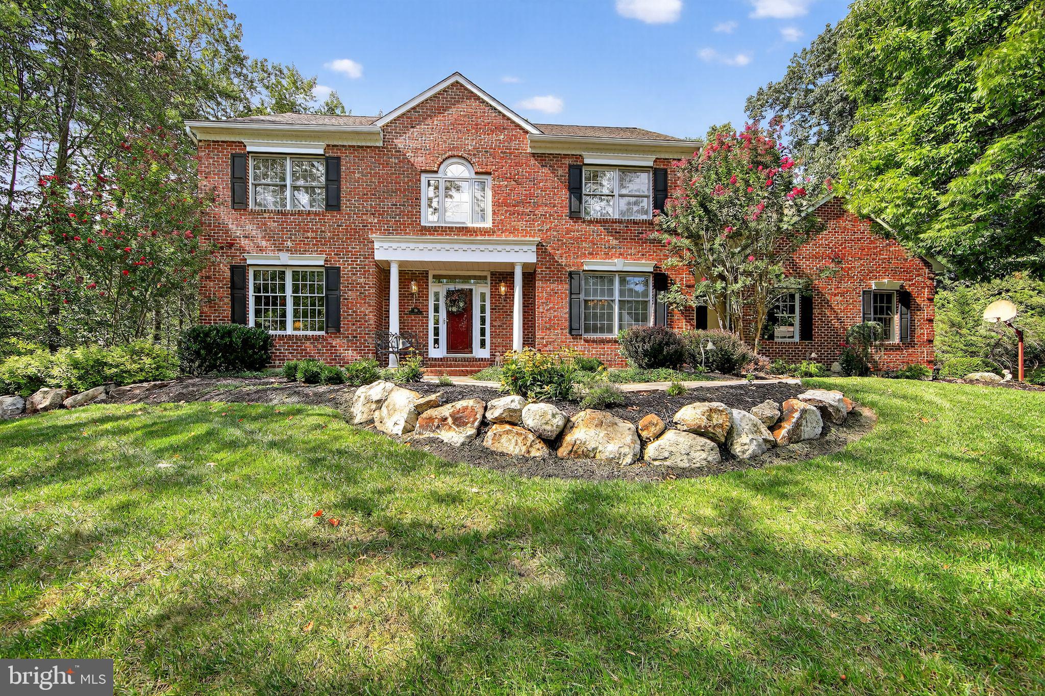 Gorgeous Setting in the coveted Woodleigh community within the award winng Downingtown East Schools including the nationally ranked STEM Academy. Conveniently located minutes to major roads, highways, Marsh Creek Lake, restaurants and shopping, this Woodleigh floor plan is designed for family living and entertaining. A curved walkway and a stately brick exterior lead to a soaring two story foyer with a dramatic curved staircase. The inviting spacious dining and living rooms feature custom millwork, while the private office showcases built-ins and fine craftmanship - WOW! The chef's kitchen is a true highlight with cherry cabinetry, upgraded appliances, gleaming granite counters, and an expanded vaulted skylit eating area with access to an oversized maintenance free deck. The adjoining spacious family room center the home with a floor to ceiling stone fireplace. This home offers an owned propane tank, three-car attached garage, and spacious mudroom. The finished daylight walkout lower level provides endless possibilities- full bath, game area, recreation area, work room, and lots of storage. At days end retreat to the sumptuous master suite with oversized walk-in closet, large double bowl vanity, soaking tub, and separate shower. An enlarged and highly sought second floor laundry room is available. Three generous sized bedrooms and a well-appointed full bath completed this level. PREMIUM Cul de sac location bordered by woods and scenic views, this exceptional property offers rare privacy and setting- truly a special home awaiting its next steward. Public water and public sewer !