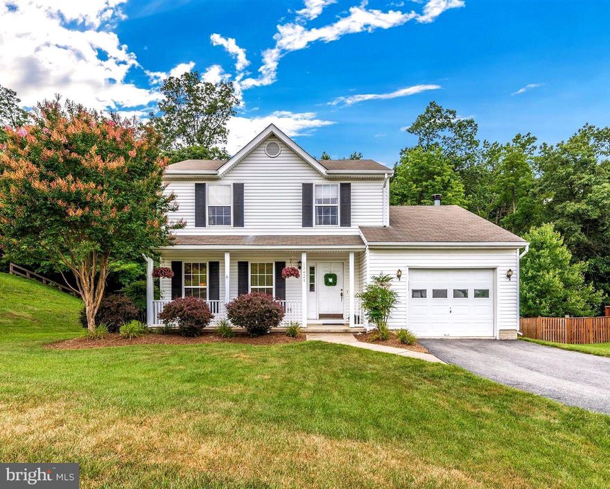 FROM COVERED FRONT PORCH TO 3 FINISHED LVLs.. SHOWS PERFECT, WITH  PRIDE OF OWNERSHIP EVERYWHERE YOU TURN, HARDWOODS, GAS HEAT + COOKING, OPEN KITCHEN WITH BAY WINDOW AND KITCHEN ISLAND, FAMILY ROOM W/ GAS FP, SLIDER TO CUSTOM WALK DOWN DECK OVERLOOKING FANTASTIC LOT BACKING TO TREES; WITH ITS OWN SPORTS COURT! FINISHED BASEMENT, OVERSIZED ONE CAR GARAGE,  EXCELLENT SCHOOLS ..SIDEWALKS!