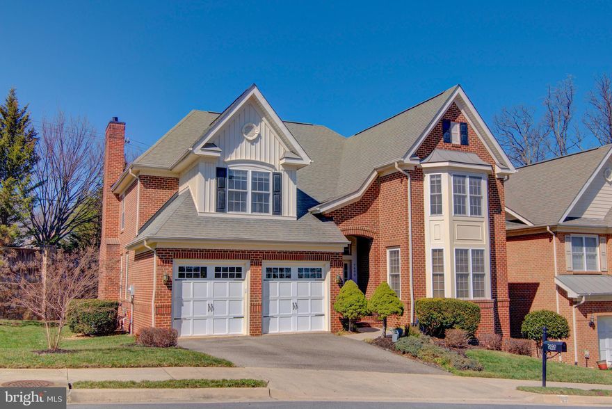 Stunning 5BR/4.5BA Home w/ 2 Car Garage & Many Upgrades! Rare 4 sided brick exterior. Gourmet kitchen w/ island, breakfast bar, furniture-grade cabinetry, dual ovens, 5 burner gas cooktop. Sunny breakfast area w/ bay window. Kitchen opens to family rm w/ gas FP, built-ins; walkout to Azek deck w/ wrought iron railings. Perfect layout for seamless indoor/outdoor living & entertaining. Main lvl office w/ gas FP & built-ins. Huge Primary Suite w/ 2 oversized WIC's, 3.5in Basswood plantation shutters, hi-grade windows (extra quiet & insulation), sitting rm w/ bay window & coffee bar. Awesome walkout/daylight LL rec rm w/ br/ba suite, custom bar area w/ wine fridge & beverage fridge; Theater rm w/ 7.1 Sony surround sound, Stewart FireHawk projector screen. Former model home w/ many designer touches, alcoves & built-ins. Mins to Ft Belvoir. Easy access to shopping, Fairfax County Parkway & 95!