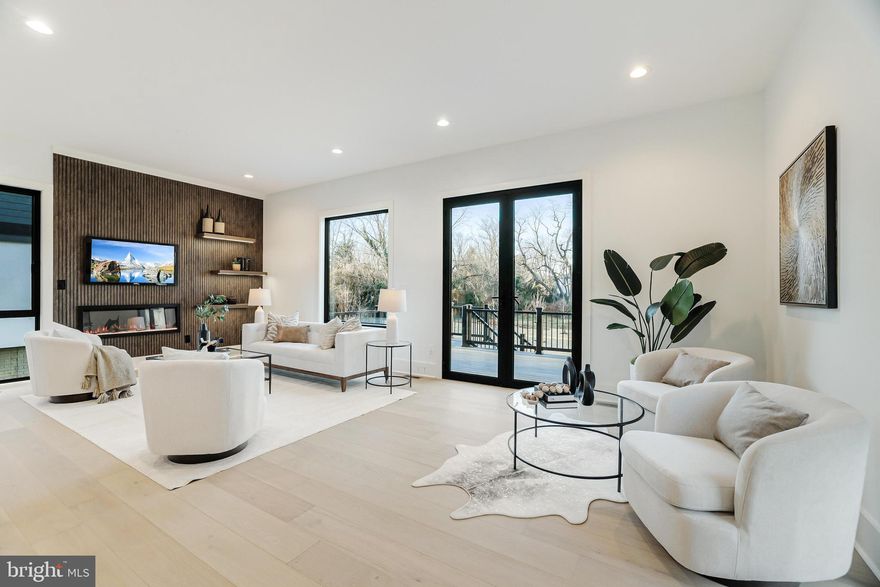 Experience the pinnacle of modern luxury in this stunning new build by KB Custom Homes, where impeccable design meets an unbeatable location.
Welcome to "Aspen" at 3506 Lake St, a stunning 5-bedroom, 5.5-bath contemporary home with 4,100 sqft of meticulously finished living space on a 0.34 acre lot and and an extensive Fenced backyard with NO HOA!
The open-concept design flows effortlessly between the living, dining, and kitchen areas, enhanced by floor-to-ceiling windows that bathe the home in natural light. Every detail has been thoughtfully curated, from hardwood flooring throughout all three levels to soaring 10-ft ceilings on the main level and 9-ft ceilings upstairs and 9-ft ceiling in the basement. 
The heart of the home—the European custom-designed kitchen—is equipped with KitchenAid appliances. Additional highlights include engineered Hardwood on all 3 floors, distinct floating vanities in every bathroom, Ceramic tiles imported from Spain, Italy and Portugal, Oversized doors, Two electric fireplaces, Wood-paneled accent walls with light channels throughout, Floating stairs and wooden panels, and a fully finished basement—all designed to elevate your everyday living experience.
A fence will be installed around the property line. 
Situated in the heart of Falls Church, 3504 Lake St provides a rare balance of suburban tranquility and urban convenience. Just minutes from Lake Barcroft, Fairlington, Arlington, the Mosaic District, and Tysons Corner, you’ll enjoy easy access to premier dining and shopping. Major highways—including I-495, I-66, and Route 50—as well as the Falls Church Metro Station, ensure seamless connectivity to D.C., Amazon HQ2, and both Dulles (IAD) and Reagan National (DCA) airports.

For outdoor enthusiasts, the home is a short drive to George Washington Memorial Parkway, Benjamin Banneker Park, and Ocean Dunes Waterpark, offering endless recreational opportunities.