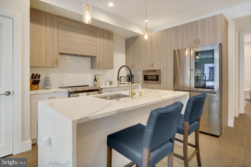 Welcome to 922 N 15th St #2!  This is an absolutely stunning newer construction unit with multiple features that make it stand out from other properties in the area! All throughout, you'll appreciate the room sizes, high ceilings, ample storage space, and luxury finishes/fixtures. Finally, a new construction home with style! The kitchen, light fixtures, and bathrooms are all modern, but the finishes were tastefully chosen for a timeless aesthetic. The layout is extremely convenient, but also allows quite a bit of flexibility. The main floor contains the open floorplan living room/dining room/kitchen, but also a full bath and full bedroom at the rear which works perfectly as a guest room, workout room, or home office. Upstairs, you'll love how spacious the hallway and bedrooms feel, taking full advantage of the 18 foot wide property. The primary suite is even more dramatic with a raised 15 ft+ ceiling and an abundance of windows, which you really have to see in person to appreciate how unique it is. This level also contains another very large bedroom (pictured with 2 beds!) and a 3RD FULL bathroom. Only to be outdone by the pilot house wet bar and two-tiered roof deck, with unobstructed skyline views. The location is also extremely convenient with WalkScore, BikeScore, and TransitScores all in the 80's - in fact, the BSL Girard Station is only about a block away... which makes any travel to Center City, Fishtown/NoLibs, Temple, or S Philly a breeze. The unit is also walking distance to Fairmount Ave shops/restaurants/nightlife, The Met, Divine Lorraine, and local favorites like Vineyards Cafe, Cambridge St Coffee, Rybread, Bar Hygge, Lorraine, & more. Property is vacant and can be seen on short notice!