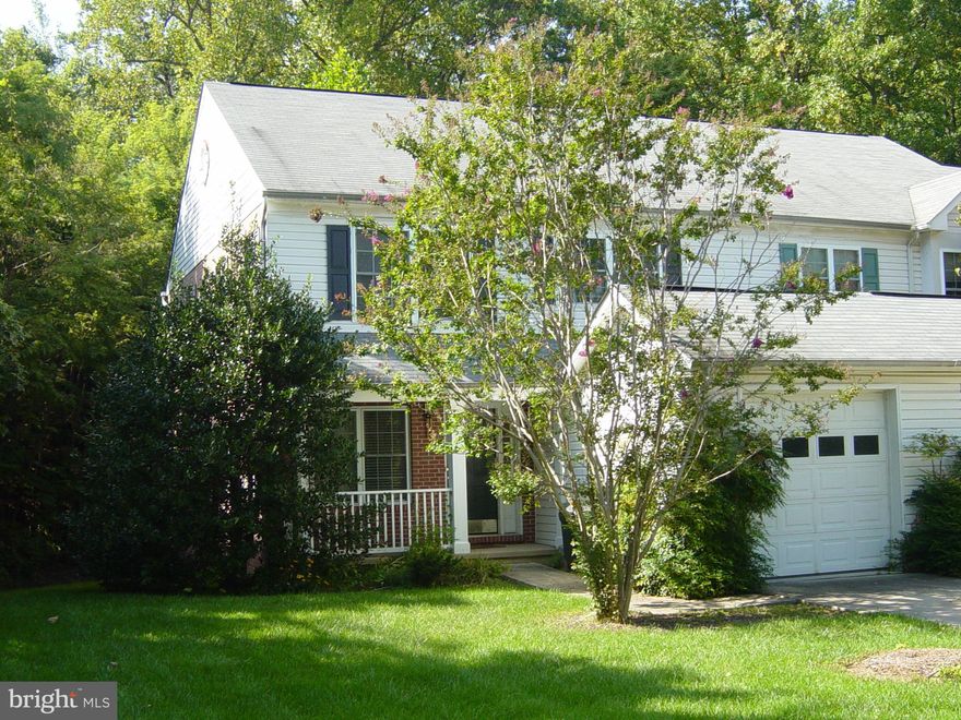 Excellent 4 Bedroom, 3.5 Bath End of Group Townhome in the Mays Chapel area..! Nice floor plan, with a fully finished Basement. Wood floors on 1st floor, with a Gas fireplace in the Family room/ dining area.. Kitchen Island,Breakfast Bar, 1 Car garage, common parking lot, and backs to woods off the Deck!  Front covered porch, and much more ... Plenty of sunlight!!!  easy to show..! owner motivated