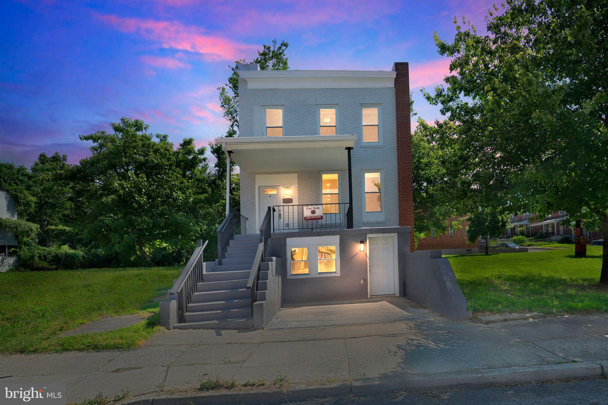 **Stunning Renovation in the Heart of Baltimore!** Welcome to 4225 Park Heights Avenue – a beautifully and masterfully remodeled home in the desirable Pimlico Terrace neighborhood. This spacious residence boasts over 2,000 sq. ft. of living space, an open and flexible main-level floor plan ideal for modern living, featuring multiple living areas, a formal dining space, and a show-stopping kitchen. Enjoy custom white cabinetry, upgraded stainless steel appliances including a 6-burner gas range, built-in microwave, 36" refrigerator, and dishwasher – perfect for entertaining and everyday functionality. Upstairs, the primary suite is a true retreat, complete with a luxurious en-suite bathroom, a walk-in closet, and an additional large closet. Two more generously sized bedrooms and a second full bath complete the upper level. The fully finished lower level offers incredible versatility with a spacious rec room perfect for a man cave, media room, or second family room, plus an additional bedroom, full bath, and a bonus room/office with walk-out access – ideal for a home gym or private office setup. Additional highlights include recessed lighting throughout, Brand new luxury vinyl flooring, brand-new windows that flood the home with natural light, 3.5 beautifully remodeled bathrooms including a half bath on the main level. The rear offers private parking and accommodates 1-2 vehicles. Don't miss your opportunity to own this move-in-ready gem, perfectly located near shops, parks, and commuter routes. Schedule your private showing today!