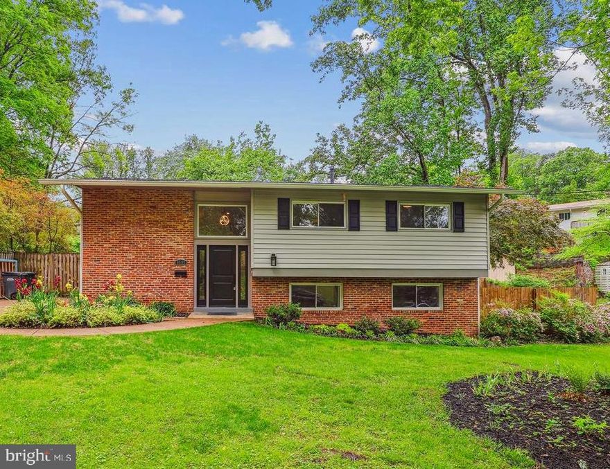 OPEN SATURDAY MAY 10: 1 to 3 pm.  This stylish and meticulously updated 4 bedroom/3 bath mid-century split foyer home, much of it tastefully renovated in 2022, offers modern comfort plus timeless charm. Situated on a generous 1/4-acre lot, the home boasts a beautifully landscaped front garden bursting with seasonal flowers, and a lush backyard complete with mature trees and a raised bed for your flourishing vegetable garden—perfect for you green thumbs out there.
Inside, you’ll find a bright open floor plan with gleaming hardwood floors throughout the main level. The heart of the home is the charming, on-trend kitchen featuring two-tone cabinetry, sleek stainless steel appliances, a marble backsplash, and elegant quartz countertops—an ideal space for both cooking and entertaining. The dining area is conveniently located adjacent to the kitchen and has a whimsical sputnik-style chandelier to make things interesting. Just off the main living area, a screened-in porch offers a peaceful retreat on those soon-to-be warm summer evenings.  Picture yourself there dining al fresco and enjoying the private, fenced rear yard.
The home includes stylishly appointed bathrooms with contemporary fixtures and finishes, adding a spa-like touch. Downstairs, the fully finished lower level features an inviting second family room, an additional bedroom—perfect for guests or extended family—full bath, a laundry room, and a versatile finished space that works beautifully as a media room, home office, or extra storage.
Located just minutes from major commuting routes, parks and greenspace, Whole Foods, Springfield Town Center, shops, and restaurants, this home offers both convenience and tranquility in a sought-after neighborhood. It's move-in ready and in excellent condition—an ideal blend of character, updates, and location.  West Springfield/Irving/Keene Mill school triangle.
