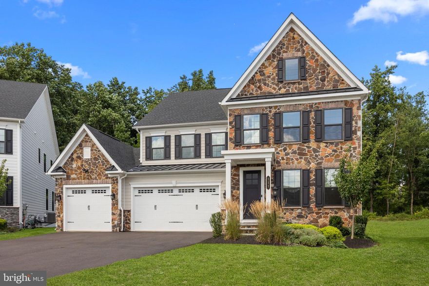 Exceptional Mayfield Home on Premium Wooded Lot – Rare 3-Car Garage
Welcome to this stunning Tyler model located in the sought-after Mayfield community, perfectly positioned on a premium lot backing to serene wooded open space. One of only two homes in the neighborhood offering a 3-car garage, this beautifully upgraded residence features 4 spacious bedrooms, 4.5 bathrooms, and a fully finished walk-up basement designed for entertaining and comfort.
Freshly painted and ready for immediate move-in, this home showcases a thoughtfully designed open-concept floor plan. The main level boasts a private study with double doors, ideal for working from home, and a formal dining room perfect for holiday gatherings.
The heart of the home is the gourmet kitchen, complete with an oversized island with seating for five, top-of-the-line Café stainless steel appliances, including a double wall oven, 5-burner cooktop with pot filler, microwave, and dishwasher. The adjacent breakfast room, flooded with natural light from triple and double windows, opens to a maintenance-free deck overlooking the tranquil backyard. A spacious family room flows effortlessly from the kitchen, creating a warm and inviting space for everyday living.
A mudroom off the garage entrance includes a built-in bench, coat hooks, and a large walk-in closet—keeping the home effortlessly organized.
Upstairs, the luxurious primary suite offers two walk-in closets and a spa-inspired bathroom featuring an oversized walk-in shower and freestanding soaking tub. Bedrooms 2 and 3 share a convenient Jack-and-Jill bathroom, while Bedroom 4 enjoys its own private en-suite. A second-floor laundry room and a versatile loft/multipurpose room complete this level.
The finished basement is an entertainer’s dream, with a custom full bar, full bathroom, and walk-up access to the backyard—ideal for hosting guests or enjoying movie nights.
Additional features include: Epoxy-coated 3-car garage floor, Tesla electric car charger, Wide-plank hardwood floors throughout the main level, Custom closet systems in every closet, Honeywell Home humidifier
This is a rare opportunity to own a move-in ready home with high-end finishes, thoughtful upgrades, and one of the best lots in Mayfield. Schedule your private showing today!