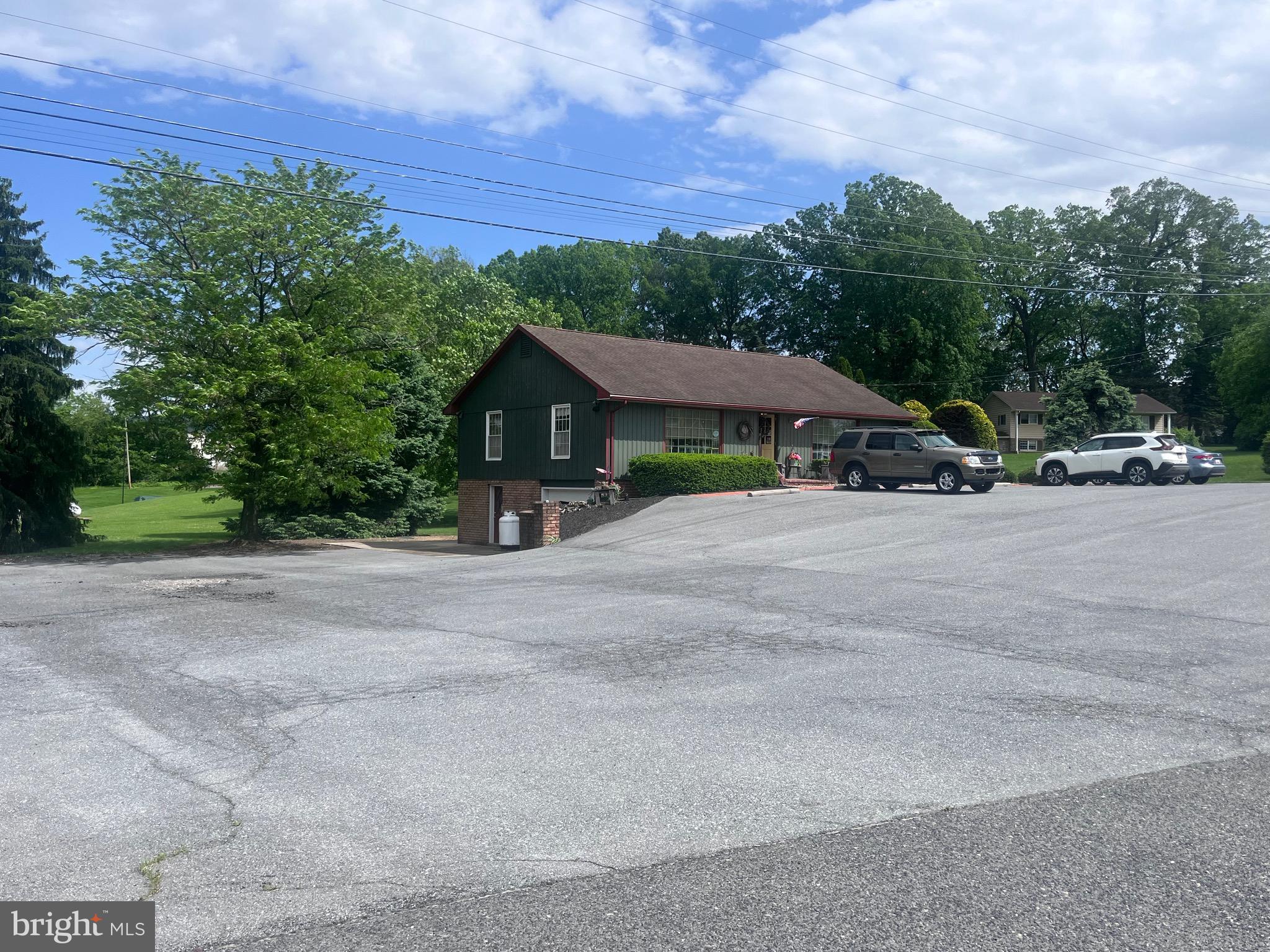 Commercially Zoned Opportunity! Previously home to Country Time Treasures, this ideally located property sits directly on Route 997, stone throw away from I-81 and just minutes from Route 11—offering excellent visibility and easy access. Public water and sewer connections are available, making development even more convenient. With its prime location and flexible zoning, the potential here is endless!
