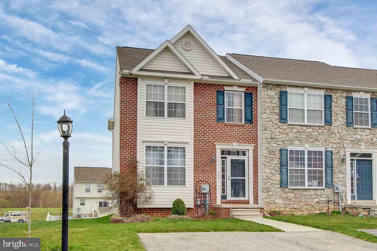 Ready to move in end unit with 9 ft. ceilings, sunroom, hardwood floors, kitchen island, master suite with shower & tub, walk-in pantry, 12' x 12' deck, walk-out basement just waiting to be finished, plenty of storage. Conveniently located to both York and Hanover/Spring Grove.