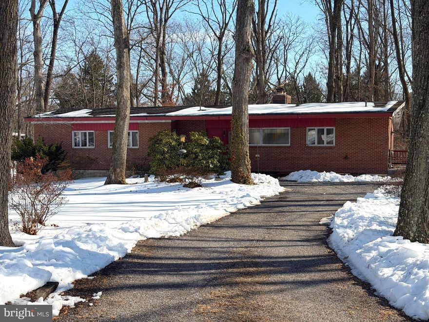 Bright, light, and full of potential, this large rancher is set on a scenic yet private 1.26-acre lot with beautiful morning views and a peaceful natural backdrop. Cathedral ceilings and oversized windows flood the home with natural light, creating an open, airy feel throughout the main living spaces. The main level features 4 bedrooms, 2.5 bathrooms, and a cozy wood-burning fireplace, perfectly positioned to enjoy views of the expansive backyard.
The large basement offers exceptional flexibility with a dedicated workshop, separate storage area, and walkout access to the yard — ideal for hobbies, projects, or future expansion. Outside, you’ll find a generous backyard with two good-sized sheds, providing ample space for storage, gardening, or recreation.
While the home needs some TLC, it offers strong bones, a fantastic layout, and an incredible setting. With a little vision and updating, this property presents a wonderful opportunity to create your dream home in a truly special location.