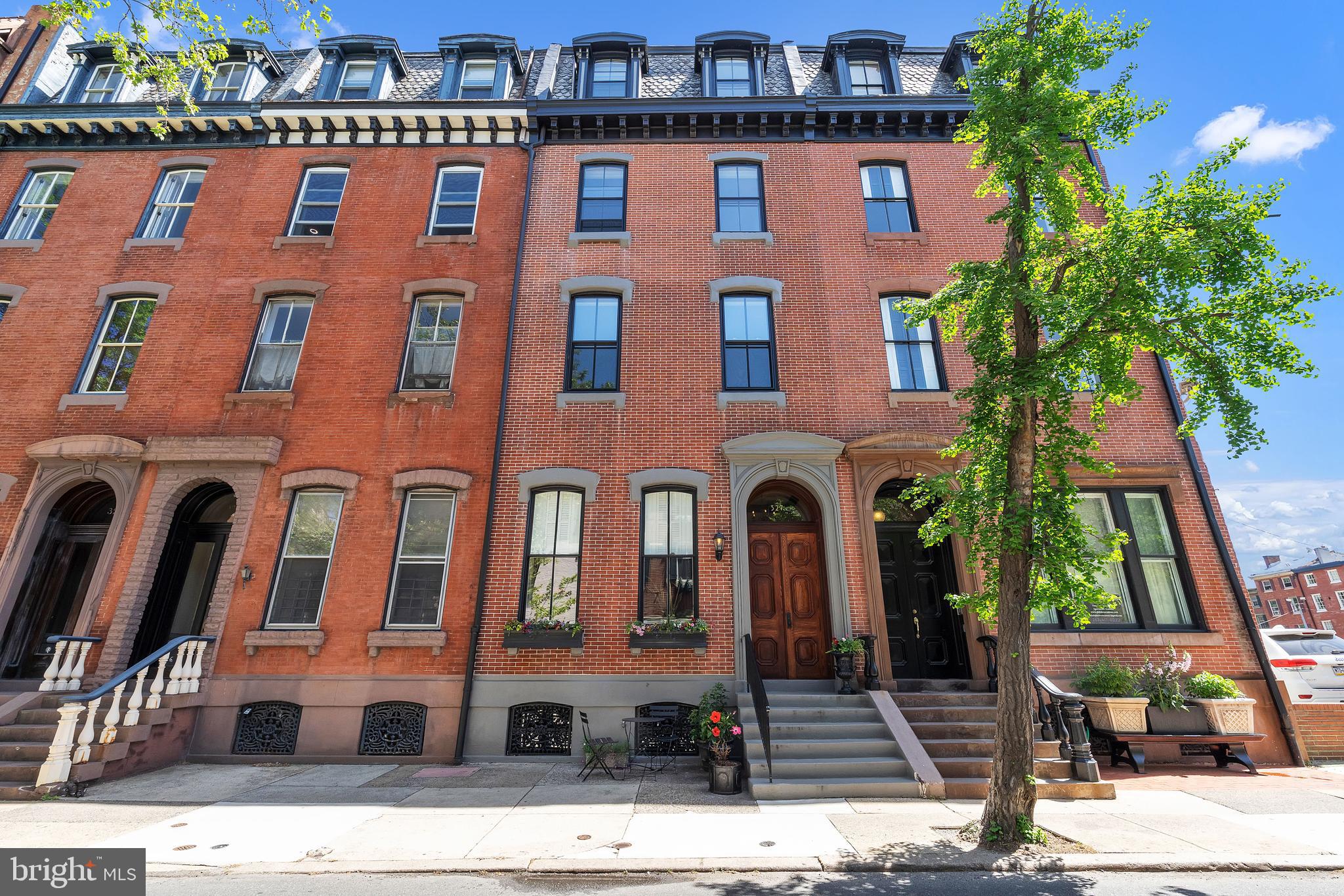 Welcome to 327 S 17th Street, a stunning home in the heart of Rittenhouse Square! This European home design boasts 3 bedrooms, 2 bathrooms, and 1,715 square feet of living space. As you enter the main living area, you’ll be greeted by exquisitely maintained original hardwood floors, and the abundance of natural light that floods through the large windows. The fully remodeled kitchen features stainless steel appliances, new countertops, pendant light fixtures, tile backsplash, a wood burning fireplace, and a large island perfect for barstool seating. Then step outside to your first of two spacious decks, where you can enjoy a peaceful moment or fire up the grill for some outdoor dining. On the main floor, you'll find 1 large bedroom offering ample closet space and 1 full bathroom. Upstairs you have 2 more bedrooms including a spacious primary bedroom & updated bathroom. Each of the bathrooms also come equipped with heated floors! The 3rd bedroom can be used as an office/den mix, & leads to your 2nd outdoor deck with stunning views. Street level at the back of your building hosts your dedicated garage parking spot off of Chadwick St . In close proximity to all of the restaurants, bars, grocery stores, and parks that Rittenhouse Square has to offer, this home is in a perfect location, schedule your showing today!