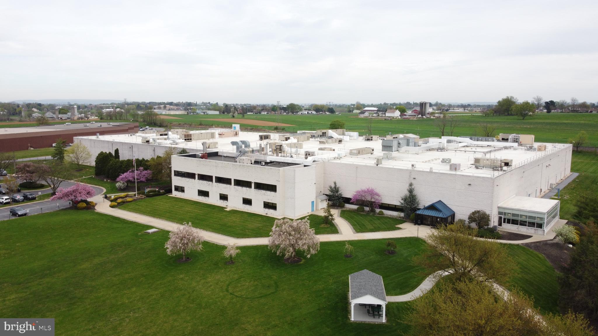 Amazing open the floorplan and new mechanicals. This amazing manufacturing facility is located on 22 acres of rolling green lawns ideal for industrial production and warehouse and distribution. $9.75NNN. Featuring all new roof, wide-open layout, new sprinkler, HVAC and lighting. The building has 1 elevator, 8+ loading docks, 1 drive-in and 24' ceilings. On-site parking for 322+/- vehicles. Potential for building expansion in the future. Can be served by rail. 140,066 +/- SF. Heavy power. If you had visited before... this is worth another look!