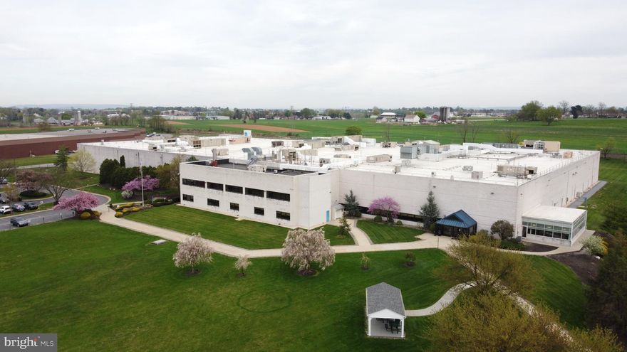 Amazing open the floorplan and new mechanicals.   This amazing manufacturing facility is located on 22 acres of rolling green lawns ideal for industrial production and warehouse and distribution.  $9.75NNN. Featuring all new roof, wide-open layout, new sprinkler, HVAC and lighting. The building has 1 elevator, 8+ loading docks, 1 drive-in and 24' ceilings. On-site parking for 322+/- vehicles. Potential for building expansion in the future.  Can be served by rail. 140,066 +/- SF.  Heavy power. If you had visited before... this is worth another look!