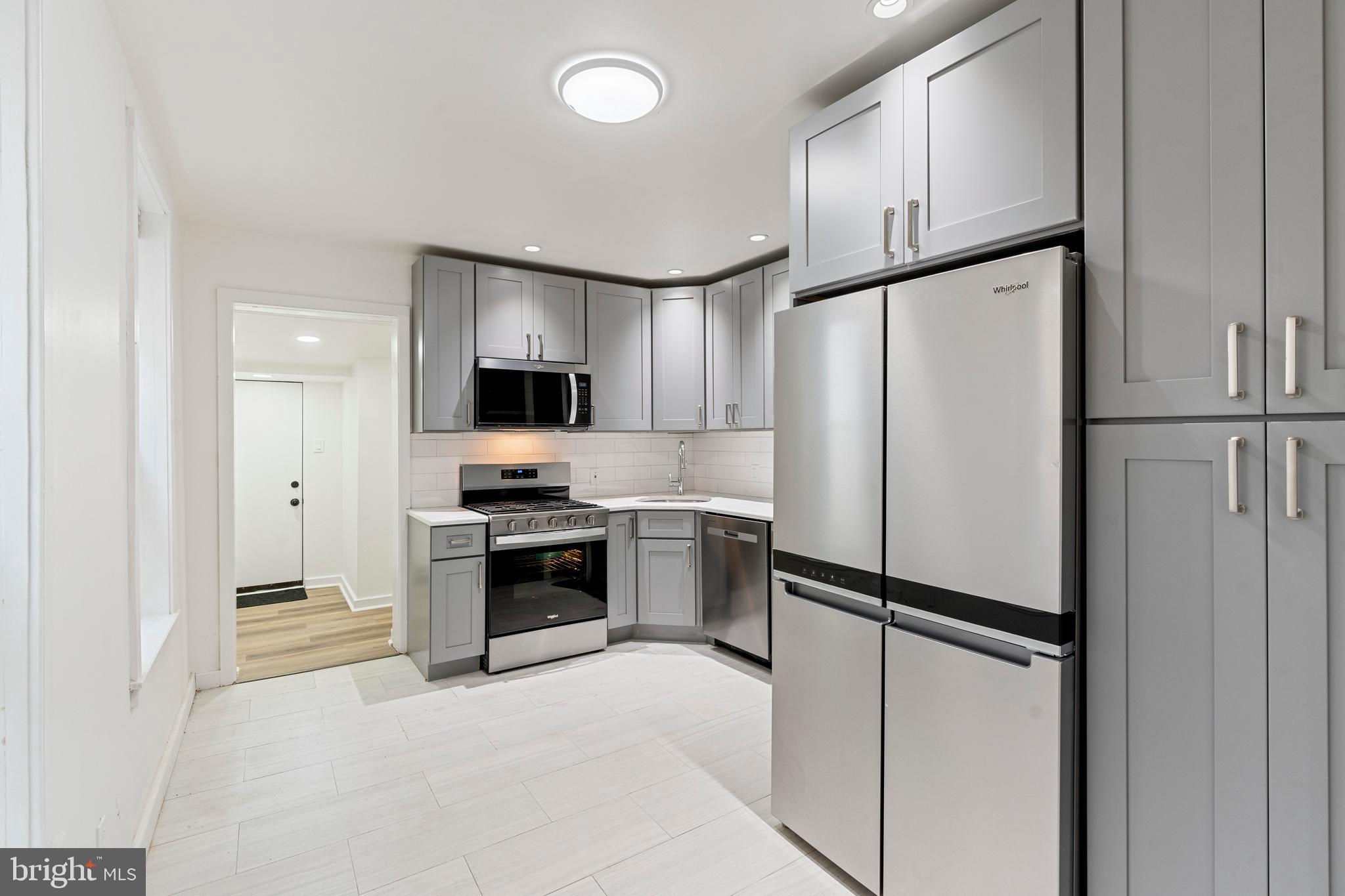 Eligible first-time homebuyers may qualify for a HomeReady First grant or a PHFA with K-Fit down payment assistance to make homeownership more accessible. Welcome to 5221 Walton Avenue, a stunning 4-bedroom, 1.5-bath home that perfectly blends modern updates with classic West Philly charm. Tucked away on a quiet, tree-lined street in the sought-after Cobbs Creek neighborhood, this home offers the best of both worlds: a peaceful, pedestrian-friendly lifestyle with easy access to the city’s vibrant energy. Every inch of this residence has been thoughtfully updated—from the brand-new kitchen and sleek bathrooms to fresh flooring, paint, windows, roof, and a new HVAC system—making it truly move-in ready. The bright, open layout flows seamlessly, with a contemporary kitchen featuring quartz countertops, stainless steel appliances, and stylish finishes that are perfect for hosting or everyday living. Nestled just steps from Cobbs Creek Park’s 800+ acres of trails, sports fields, and green spaces, this location is a haven for outdoor enthusiasts. Enjoy close proximity to Baltimore Avenue’s diverse eateries, local markets, and charming bookshops. Commuters will appreciate easy access to trolley lines, SEPTA buses, and major thoroughfares connecting to University City, Center City, and beyond.