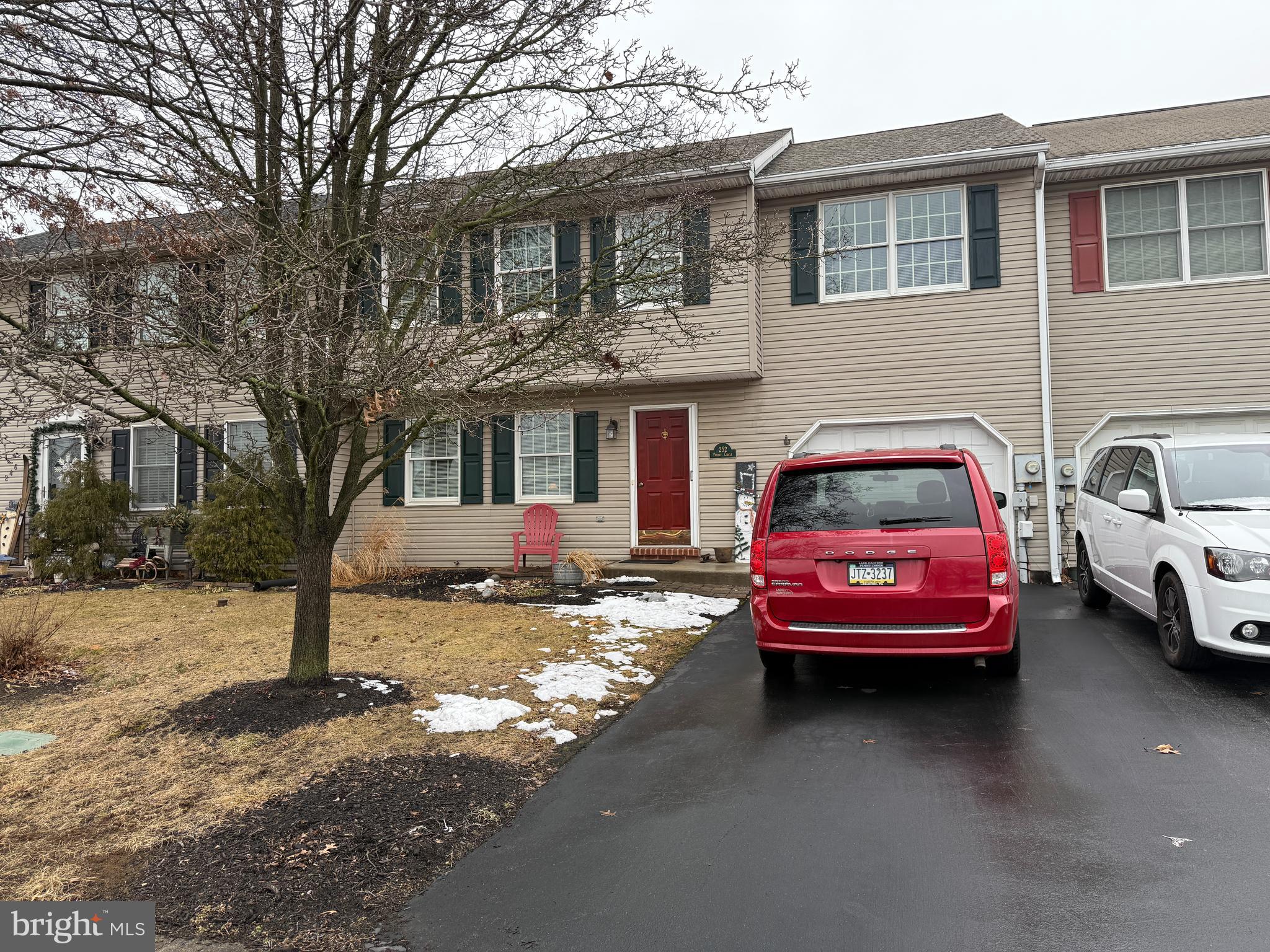 NEW ADJUSTED PRICE! SPACIOUS, CHARMING & MOVE-IN READY in the sought after Breezewood Forest community! 2-Story 4 bd, 2.5 bath, Townhome! This inviting residence boasts generously sized rooms & ample storage in a meticulously maintained setting. One of the few models featuring 4 SPACIOUS BEDROOMS, yes-4! 2.5 baths, along with a finished basement! The warm ambiance of the lovely Living room greets you, where bright laminate floors flow seamlessly into the open dining area. The dining room is flooded with natural light, thanks to sliding glass doors that lead to a large deck (to be painted when weather permits) & nicely landscaped, fenced yard—perfect for outdoor entertaining & space for play. For cooking enthusiasts, the roomy oak kitchen offers an ideal space to whip up your favorite meals. It includes a pantry for additional storage, a large island with countertop workspace, above range microwave, smoothtop ovenrange, & extra cabinets w/ SS frig included. A convenient laundry (washer & dryer included) area & half bath are located on the first floor, just off the back entrance access to back yard. Ascending to the 2nd floor, you'll discover a spacious primary suite complete with a fantastic walk-in closet. The primary bath features a brand-new walk-in shower with elegant glass doors & skylight to let the sunshine in. You'll appreciate the size of the 3 additional gracious bedrooms! The pull-down attic provides extra storage—an uncommon find in a townhome. But that’s not all! The lower level features a partially finished family room equipped with built-ins and an under-stair closet for creative storage hideaway. The basement also includes additional unfinished space perfect for storage & workshop area, complete with shelving & a workbench. Nestled on a extra-large quiet cul-de-sac, this home offers ample parking & room for little ones to learn to bike! The roof was recently replaced in 2011, ensuring peace of mind. Enjoy the economic benefits of warm gas heat & cool central air conditioning. Convenient Handi-cap stair lift! (can be removed if requested). This sought-after community features sidewalks & streetlights for leisurely strolls. Conveniently located near major roads, popular restaurants, & shopping amenities, PLUS just moments away from the exciting adventures at Hershey Park “The Sweetest Place on Earth”! A wonderful place to call home!