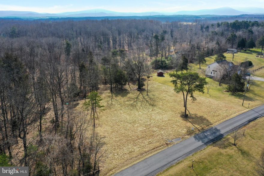 1.1 acres in a quiet subdivision with easy access to I-66.  Engineering completed for a 3 bedroom micro-fast drip system.  Great location and we have a Class A contractor ready and waiting to build your dream home!