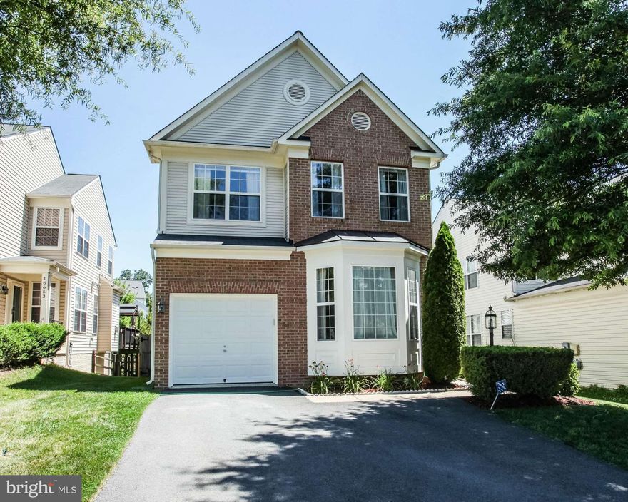 Amazing & Loaded w/ Upgrades!! Tons of natural light, great hardwood floors, recessed lights, & great open concept. Gourmet kit w/ corian counters, ceramic tile floors, & tons of cabinet/counter space. Family RM off kit w/ gas FP & walkout to HUGE deck & yard. Basement w/ 4th bedroom, full bath, & tons of storage space. Master BR w/ WIC, sitting room & luxury bath w/ ceramic tile & soaking tub!!