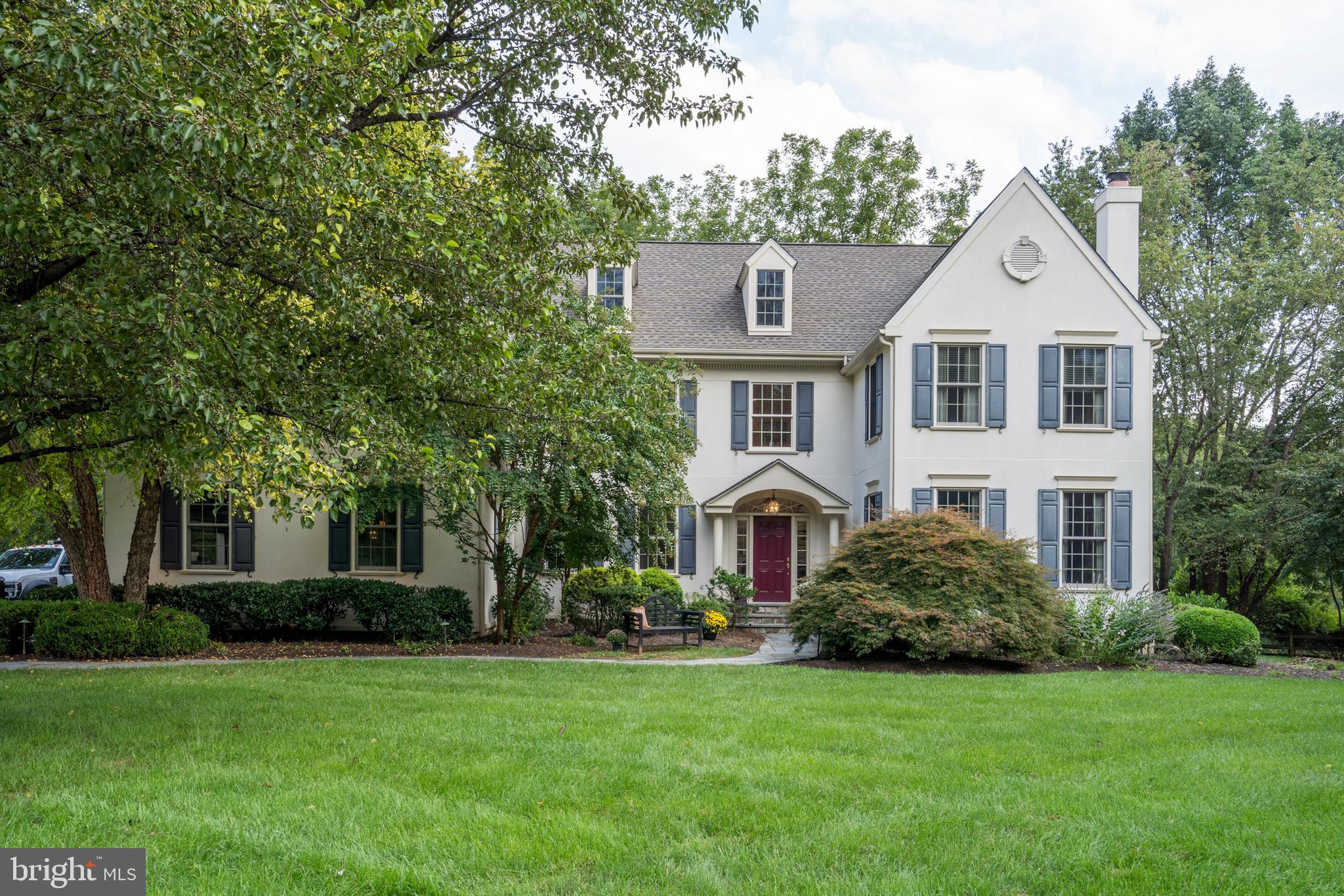 This stately Turnbridge colonial in Tredyffrin-Easttown School District has it all! The oversized kitchen has been completely renovated into a gourmet cook's delight with beautiful granite countertops, a large island, custom cabinetry, and attention to every detail in the design. A sub-zero refrigerator, Wolf 6 burner range, Wolf full double oven, built-in microwave, pull-out spice rack, 2 Miele dishwashers, 2 garbage disposals, skylights, lots of storage, and a sub-zero beverage refrigerator complete this extraordinary renovation. This lovely home has many dramatic features including a two-story entry foyer, vaulted ceilings, cathedral windows, quality millwork and flooring, exterior accent lighting, and a backup whole house on-demand generator! A soaring foyer will lead your guests to a sophisticated living room with a fireplace that has a marble hearth and decorative chimneypiece. Off of the living room is a study with crown molding. The formal dining room features large windows with stunning private views. The large family room features vaulted ceilings, built-ins for your media entertainment, a stone fireplace, and a dramatic wall of windows. Entering from the side is a mudroom with wainscoting, custom-built storage with charging stations, and a large walk-in pantry that could be converted to another use. The laundry room features custom cabinetry. The master suite features a separate sitting room, a large ensuite bathroom with a frameless shower, a Jacuzzi tub, and a custom walk-in closet by Closets by Design. Bedroom 2 has an ensuite bath with a skylight, a ceiling fan, and a walk-in closet (pulldown stairs here to attic storage and a cedar closet). Bedrooms 3, 4, and 5 all have ample closets. All Closets on this level have custom designs. This level is completed with the hall bath with double sinks. The daylight basement features hardwood floors and a spacious game room that includes a custom bar with a sub-zero beverage fridge. There is a media room, a hobby room, a full bath, an exercise room, and ample storage. Serenity is the mood in this fully fenced backyard with a stone patio with a built-in fireplace, low voltage lighting, and a 55" built-in Lynx gas grill. Additional upgrades include complete stucco remediation along with the installation of all-new Anderson Windows (2010) replacement of the roof in 2016, 3 zoned heating with Nest thermostats in 2019, both fireplaces have gas inserts, there is a holiday lighting package, water heater replacement with water cop protection, 2016), full house security system, underground irrigation system, and storage units in the garage. The community amenities include open space, walking trails, and a tennis/pickleball court. All room sizes are believed to be accurate but should be independently verified. Professional photos to follow. Agent is related to the seller.