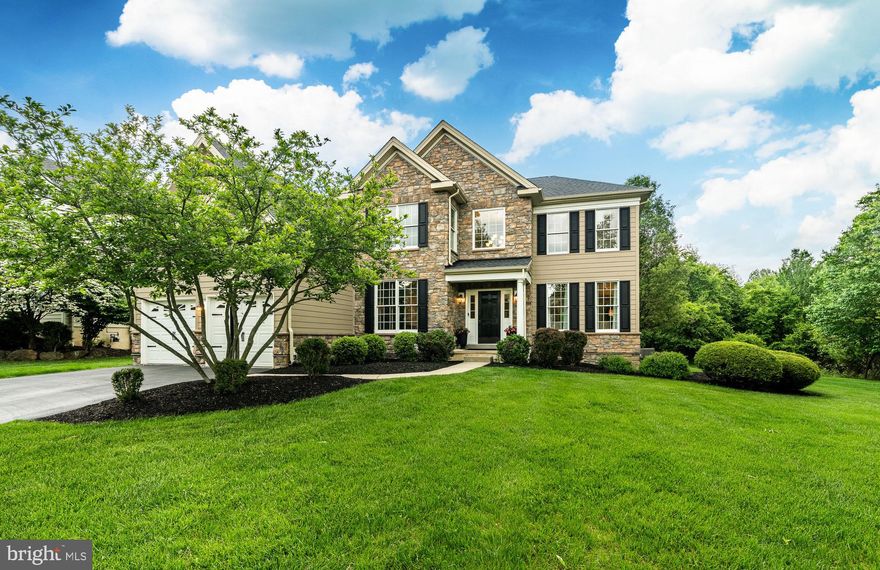 Welcome to 1029 Barclay Road —RARE OPPORTUNITY to own one of the most desired lots in the highly sought-after Byers Station community of Chester Springs. Located within the award-winning Downingtown School District, this move-in ready property offers the perfect blend of elegance, comfort, and convenience. From the moment you arrive, you’ll appreciate the beautiful landscaping and serenity of a private lot with a peaceful wooded backdrop. Step inside the vaulted entryway, where natural light and timeless character set the tone for the entire home. To your right, a formal living room flows seamlessly into the formal dining room, both accented by chair railings and crown molding. The spacious eat-in kitchen features stainless steel appliances, ample cabinet and counter space, a large island with additional seating, and a built-in nook ideal for a desk or homework station. The adjoining dining area provides access to your private back patio, creating an effortless indoor-outdoor entertaining experience. The open floor plan extends into the inviting family room, boasting dramatic vaulted ceilings, oversized windows with views of the backyard, premium plantation shutters, and a stunning stone fireplace. A dedicated home office with custom shelving and cabinets with  double doors for privacy, half bath, and laundry room complete the main level. Upstairs, the primary suite offers a spacious retreat with a seating area and a large walk-in closet. The luxurious ensuite bath features dual vanities, a soaking tub, and a tile-surround walk-in shower. Three additional generously sized bedrooms share a full hall bath, ensuring comfort and privacy for family and guests. The fully finished basement expands your living space with new carpeting and room for a home theater, gym, playroom—or all of the above! Out back, your private patio overlooks the wooded yard, providing a tranquil oasis for morning coffee, summer barbecues, or evening gatherings. Living in Byers Station means enjoying an amenity-rich community with pools, walking trails, playgrounds, and more—all while being just minutes from shopping, dining, and major routes. This is more than a home—it’s a lifestyle. Schedule your showing today and make 1029 Barclay Road your own!