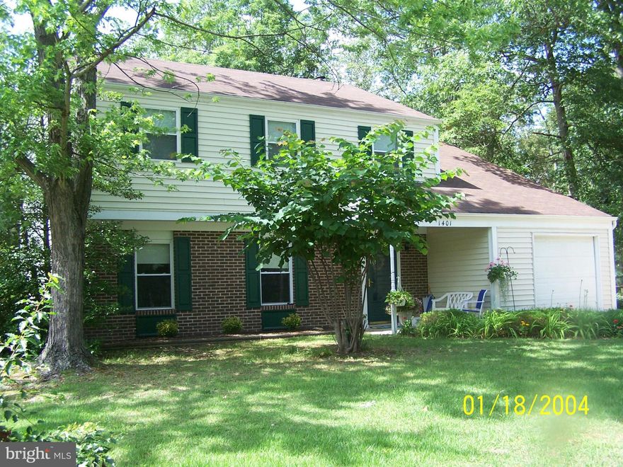 ROOMY COLONIAL on 1/2 ac.of grassy play area.. Conv. to Mall, 25- 35 minute drive to Capitol or National Harbor. 4 lrg Bdrm, 2.5 baths..Recently remdld Country Kitchen with Oak cabinets, Oak corner cabinets, hutch,  table and chairs Convey.  Great Fam Rm/w Brick Fireplace nestled btwn built-in Oak book cases..Leads to patio and Lg back yd/w Woodset swing & Play Station. Fenced on 3 sides, Shed.