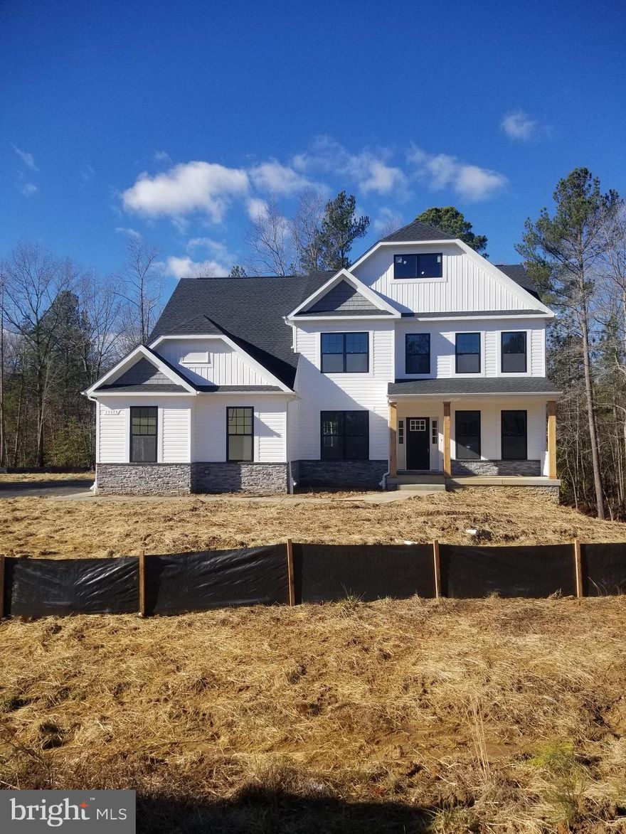 Custom Pinehurst Elevation 3 with many exterior and interior upgrades and modifications.