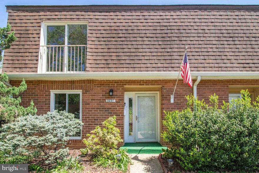 Beautifully  maintained 3-bedroom, 2½ bath townhouse in Fairfax Plaza with loads of natural light in the Woodson HS pyramid. Move-in ready with gleaming hardwood floors, fresh paint and brand-new carpet throughout. The formal living room features a double Juliet balcony with serene views of the community pool and common grounds. Step into the elegant dining room, followed by an eat-in kitchen with granite countertops and stainless-steel appliances (oven and microwave - new 2025). Upstairs, the spacious primary suite includes a Juliet balcony, large walk-in closet, and private en-suite bath. Two additional bedrooms share a hall bath. Enjoy ample storage, reserved parking, and access to the community pool. Just moments to Fair City Mall and downtown Fairfax shops, dining and entertainment, with quick access to Little River Turnpike, Route 50, and I-495!