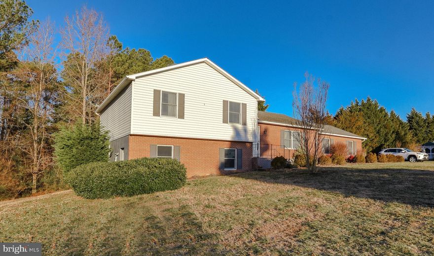 Quiet peaceful setting on just over 2 1/2 acres.  Multi level living gives you plenty of space to spread out.  As you enter the foyer the home opens up to the living room, dining room and kitchen.  Stairs lead you to the upper level with 3 bedrooms and 2 full bathrooms.  Another set of stairs lead you down to the rec room., storage room and laundry room.  The dining room has sliders leading out to the screened porch perfect for a morning cup of coffee or a quiet evening relaxing.   Primary bedroom is spacious with a full bath and walk in closet.  The side load garage provides ample space for parking.  There is also a shed and asphalt driveway which allows for additional parking.  Close to schools, restaurants and shopping.  Easy commute to base and other areas amenities.  Schedule appointments today!