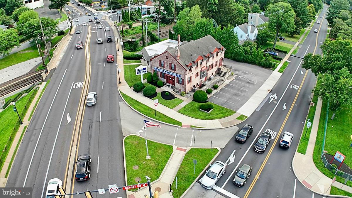Fowler and Co Realty is pleased to present this rare, income-producing investment opportunity in Jenkintown, Pa. The professional office space is centrally located along Old York Road (Route 611), providing convenient access to the PA Turnpike, Route 1, Regional Rail and various Septa Buses. Situated on a corner lot, this 8,400 square foot building is 100% leased to six tenants. However, there is the potential for a storage tenant to occupy the sub-basement.
Each unit is accessible via a private entrance from the parking lot. Each unit includes a private heating/cooling zone. Each unit includes at least (1) private bathroom. Units range in size.
In recent years, the current owners have made significant investments throughout this 3 story beauty, including roofing repairs, sump pump and french drainage installation, various exterior door and window replacements, resealing the private parking lot and much more. In conjunction with being one of the most highest-trafficked roadways in Montgomery County, Pa, this corridor brings a strong consumer and business draw to the area. This could contribute toward the strong rental history over the years.
As a bonus feature, the front exterior includes two private advertisement opportunities. An illuminated billboard sign is fixated to the property, while the pole signage presents as a stand alone fixture near the intersection curb. Two great ways to advertise your new business with township approval.