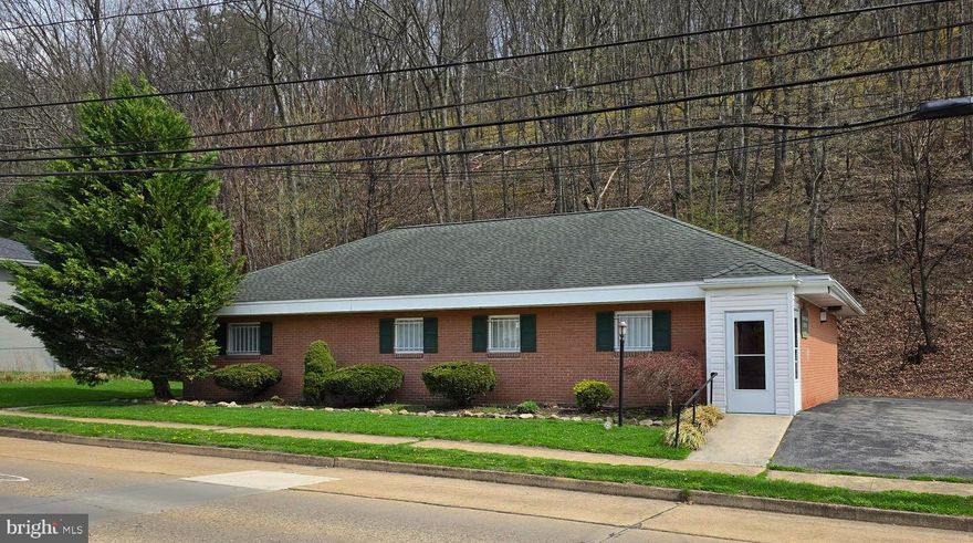 Professional office building in a convenient location with ample on-site parking. This well-designed space includes a welcoming reception area, four private offices or patient rooms, a conference room, and three restrooms. Offering approximately 2,100 square feet, the property was previously used for medical purposes but is suitable for a variety of business uses. Currently vacant and ready for immediate occupancy—an excellent opportunity for your next venture.