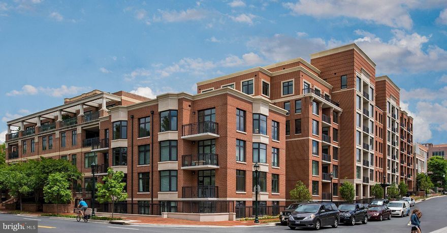 Hampden Row is a collection of luxury residences located in downtown Bethesda.  Unit 301 offers 2 large bedroom suites with tons of closet space, a bonus den/office, 2 thoughtfully designed baths with quartz counters, custom vanities, and the owner's bath featuring marble tiles and freestanding Roman tub with separate glass shower, plus powder room in the front hallway.  The gourmet kitchen is fit for a chef offering both innovation and function from the custom white cabinetry to the quartz countertops and high-end appliances throughout.  The kitchen island makes for the perfect breakfast bar.  This home also offers in-unit washer & dryer, wide-plank flooring throughout, custom plantation shutters, custom wallpaper and designer touches.  The residence comes with two assigned garage parking spaces.  Hampden Row offers 24-hour attended lobby, rooftop fitness center and landscaped terrace with firepit and grills, residents' lounge, bicycle storage and on-site property management.  Bethesda is one of the most sought-after cities due to its several top-rated restaurants and high-end retailers, and proximity to nearby Metro servicing metropolitan areas such as Friendship Heights and downtown Washington, DC.