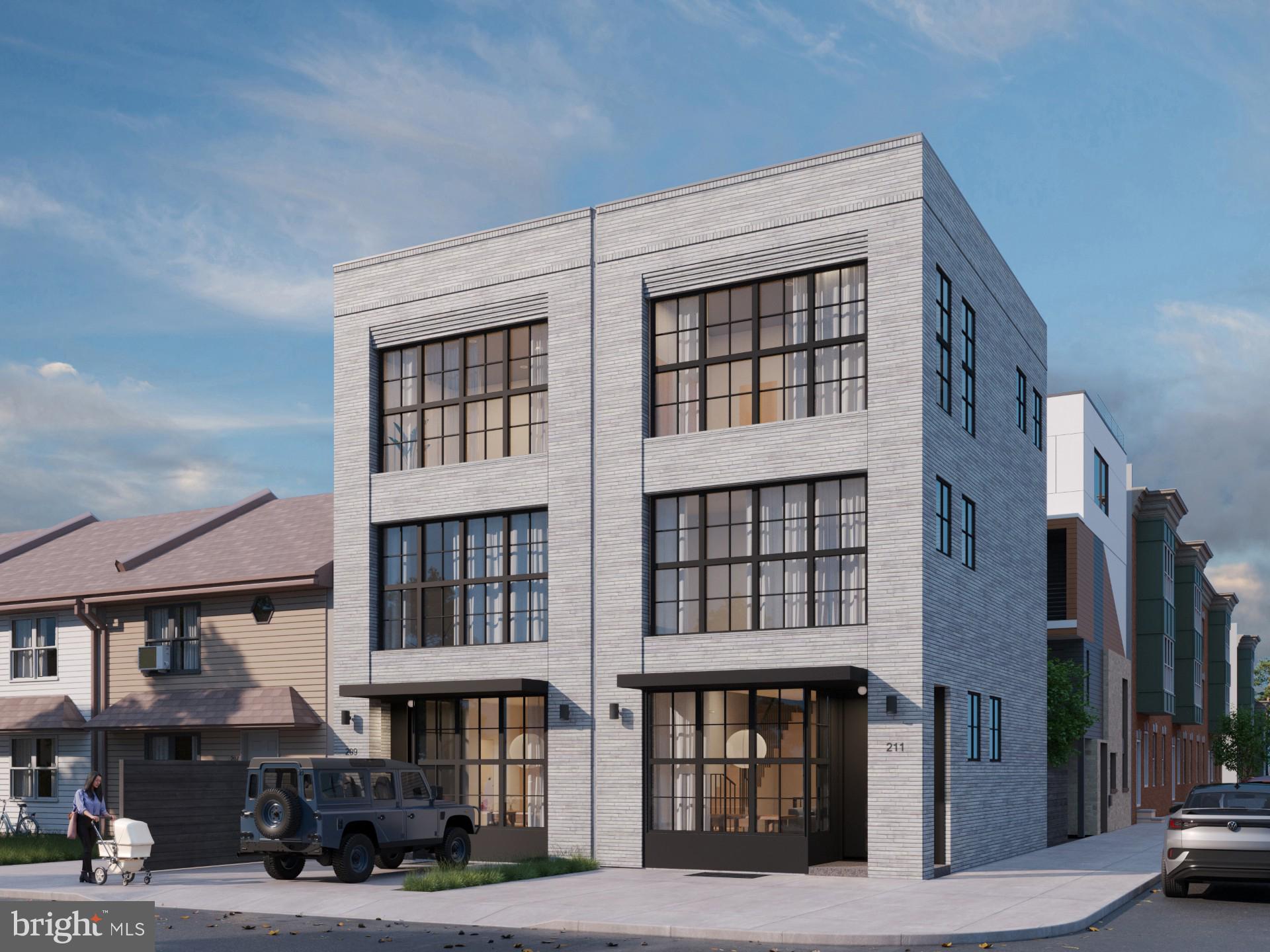 **Delivery expected April 2026 with 10-year tax abatement**
Introducing 209 and 211 E. Wildey St, two 19' wide townhomes on the riverside in booming Fishtown. The homes will blend modern style and contemporary functionality at tremendous value in the heart of Fishtown. Whether you're drawn to the corbeling brick facade, the 2-car off-street parking, or a private outdoor oasis, every detail at 209-11 E Wildey St has been meticulously curated by a team of highly respected architects and developers. Inspired by Fishtown's industrial past, these homes will employ large loft-like windows deeply recessed to create shadows across the facade and reveal several planes of linear raked brick.
The kitchen will feature rift oak cabinets with under-cabinet lighting, concrete style countertops and backsplash, Louis Poulsen pendant lights, and a premium Bertazzoni appliance package. The primary suite will span the entire second floor and will be as luxurious as it is functional-- with a large walk-in closet, a spacious bathroom with a stand-alone tub and shower and floating dual vanities.
Secure your place NOW for a chance to tailor interior finishes to your exact specification and need! Optional upgrades include built-in sound system, rooftop pedestal deck, panel-ready refrigerator, custom built-ins, radiant heated floors, and much more! Reach out to the listing agent with questions or for more information!
All square footage and dimensions are approximate and should be independently verified by the buyer. Renderings, floor plans, and images are for illustrative and artistic purposes only and may not reflect final construction details. Features, finishes, and specifications are subject to change without notice.