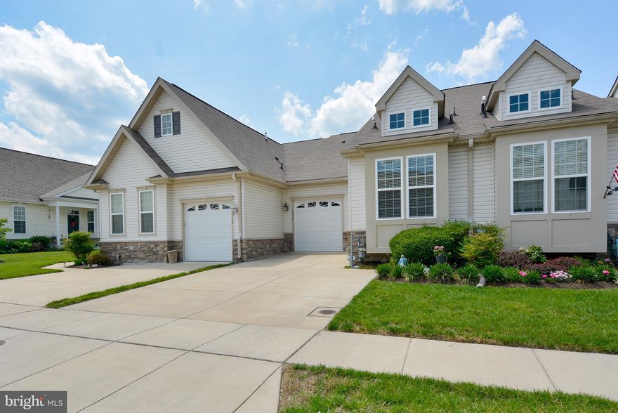 REDUCED SELLERS RELOCATING, 2 LEVEL, LUXURY VILLA w/1 CAR GARAGE IN SOUGHT AFTER SHIPLEY'S CROSSING.  OVER $80,000 IN UPGRADES. 1st Floor living. 2 Bedrooms, 3 Full baths, fully finished w/walkout lower level.  Large deck faces private wooded area. Active Adult Community, permanent residents 19+. Carefree living, lawn care, snow removal. Clubhouse, heated pool, fitness center, walking trails.